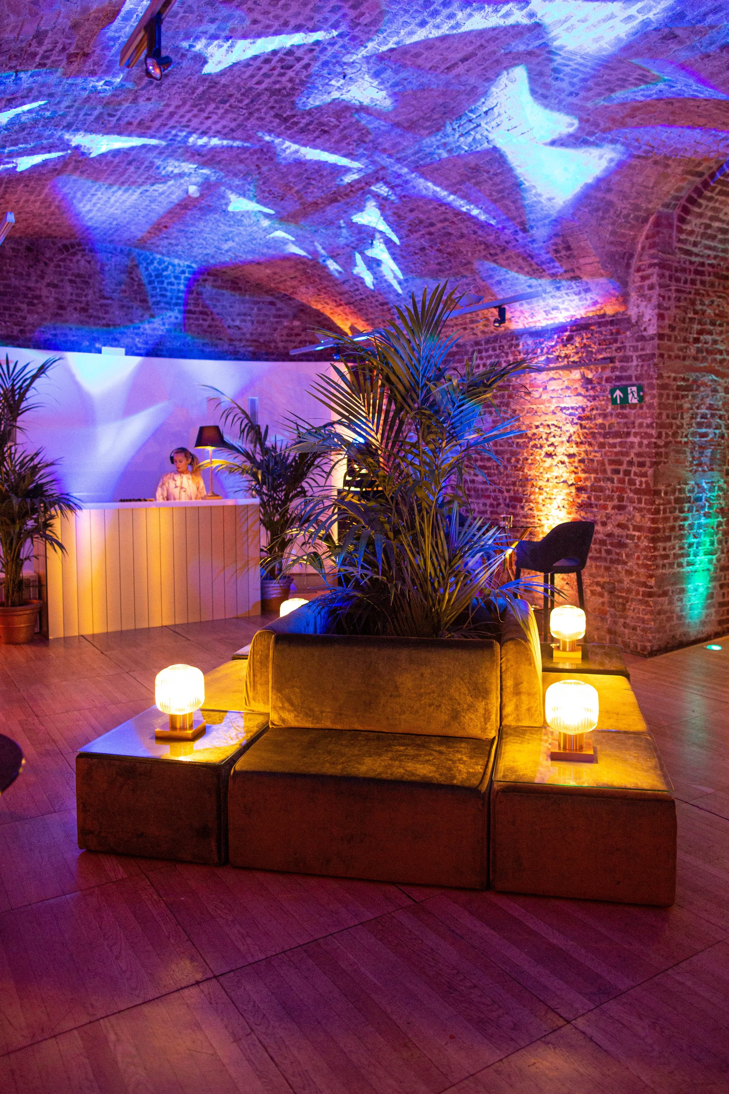 Wedding reception lounge furniture and lighting in underground vaults
