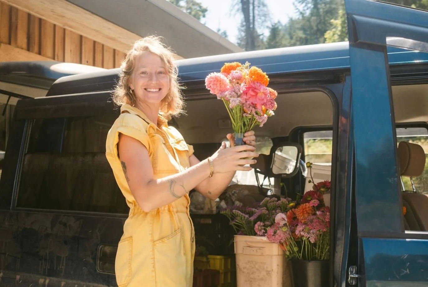 Thank you @yaylove.wedding for capturing me in my buttercup suit and my gaggle of flowers in their (xsmall) (not very clean) mini van. Setting up for T&amp;T by the ocean was a little buttercup&rsquo;s dream come true☺️🌼☺️🌼☺️