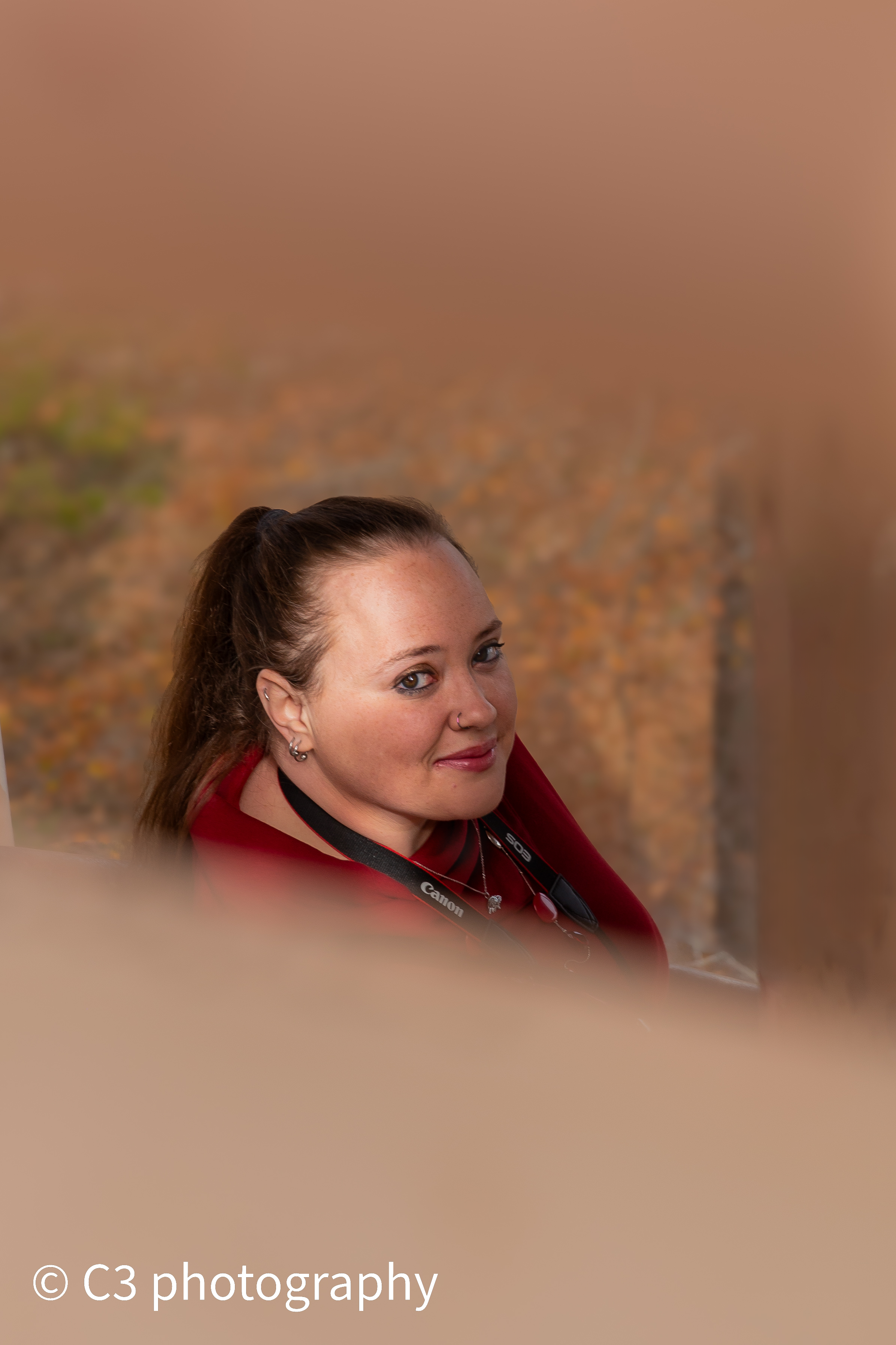 unique portrait photography through rails sitting on stirs to a lookout tower in southern Illinois