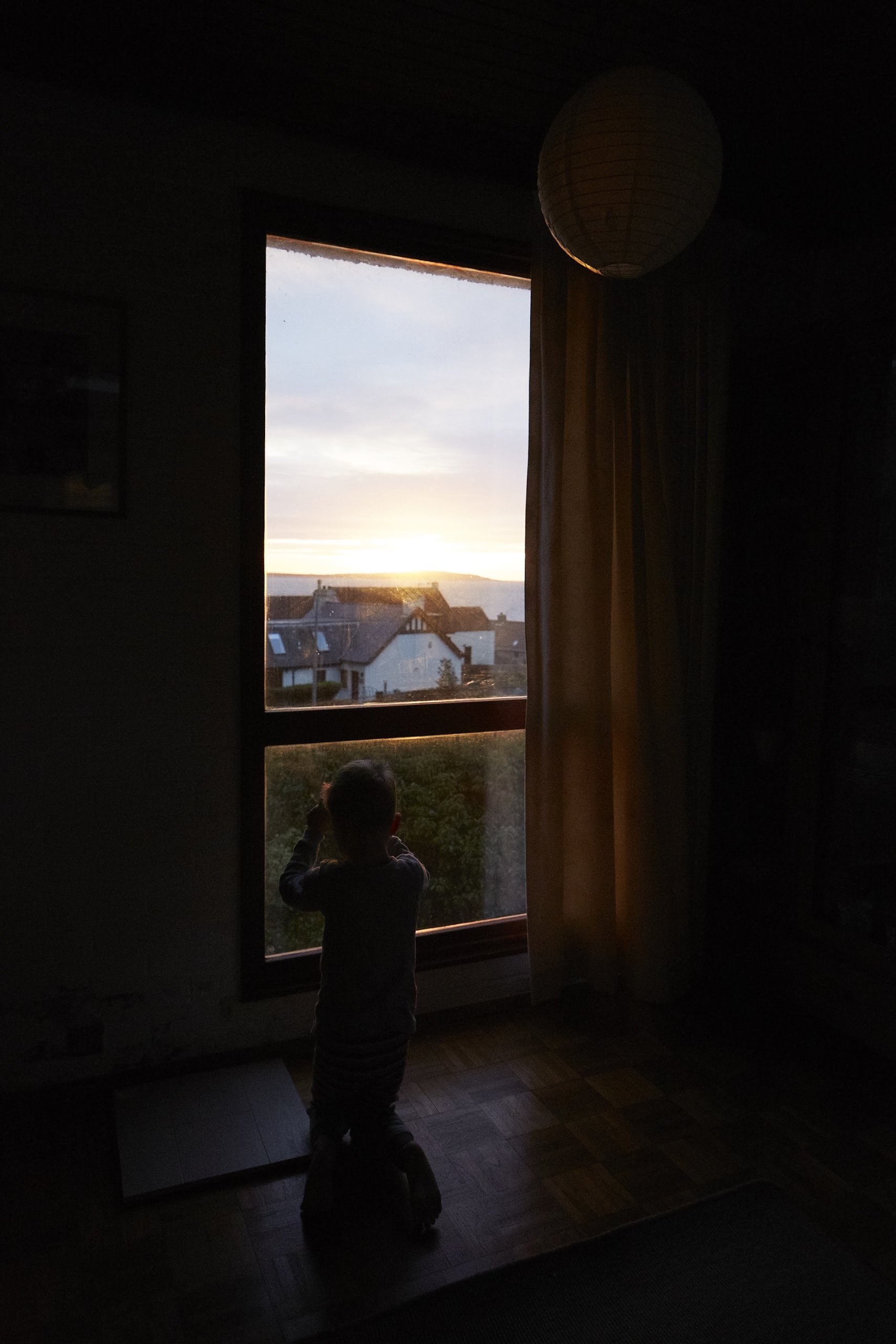 Lachlan looking out of the window