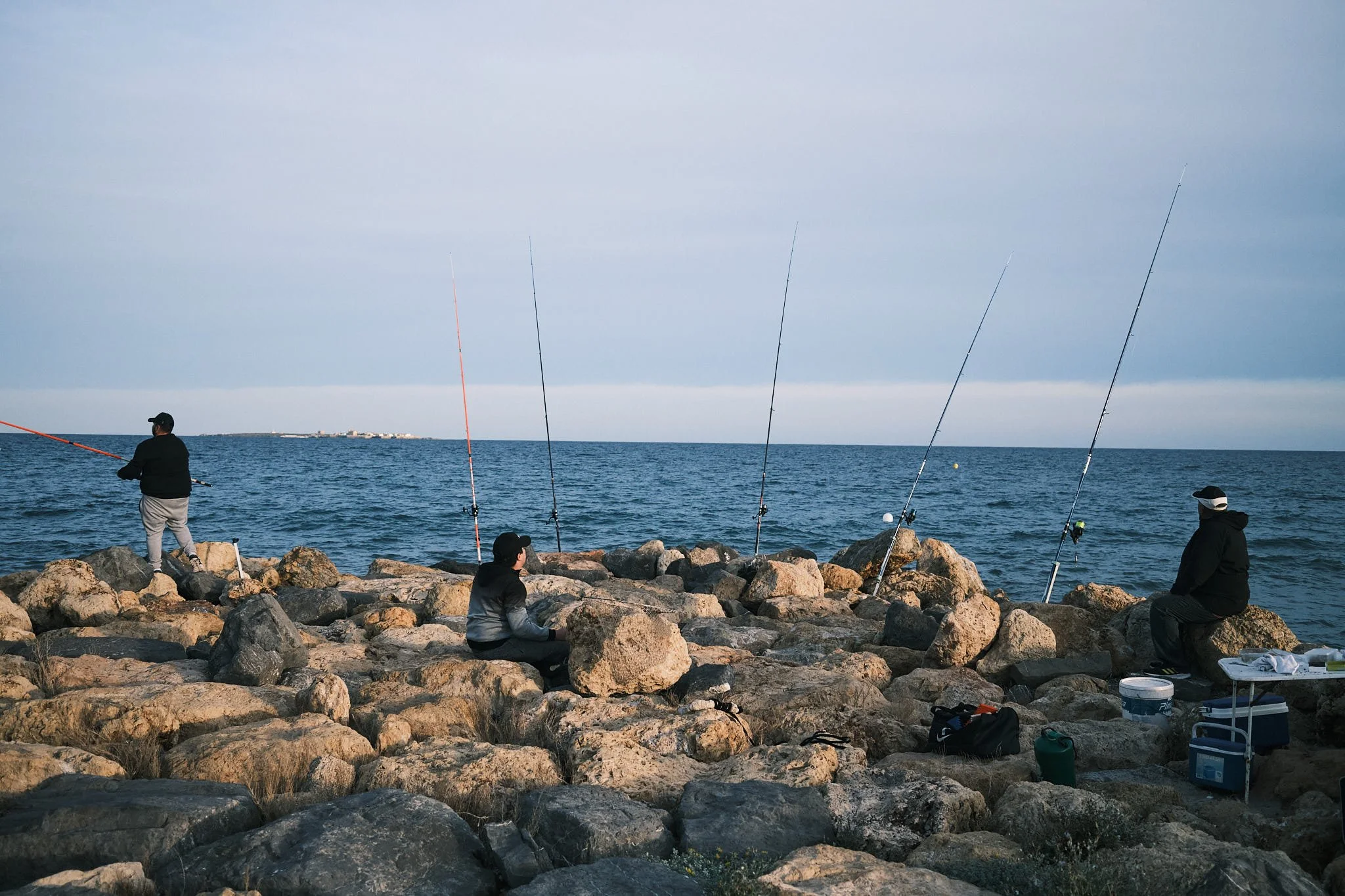 fishing off the rocks, Spain 