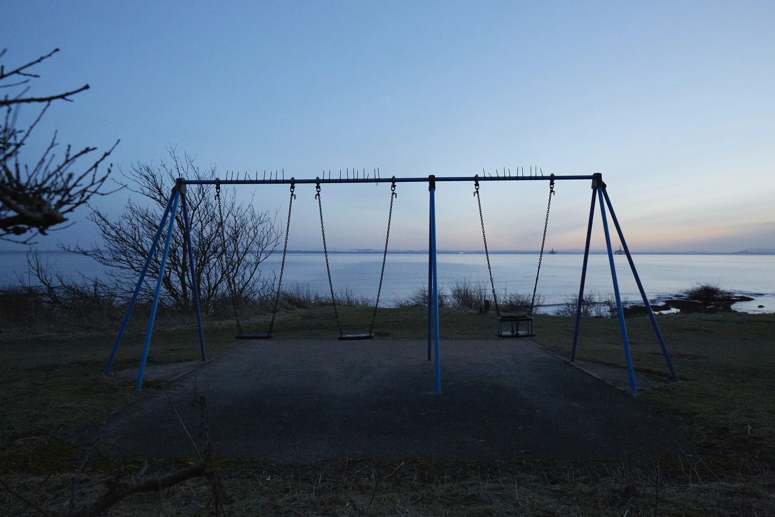 Swings over looking the sea, Fife, Scotland