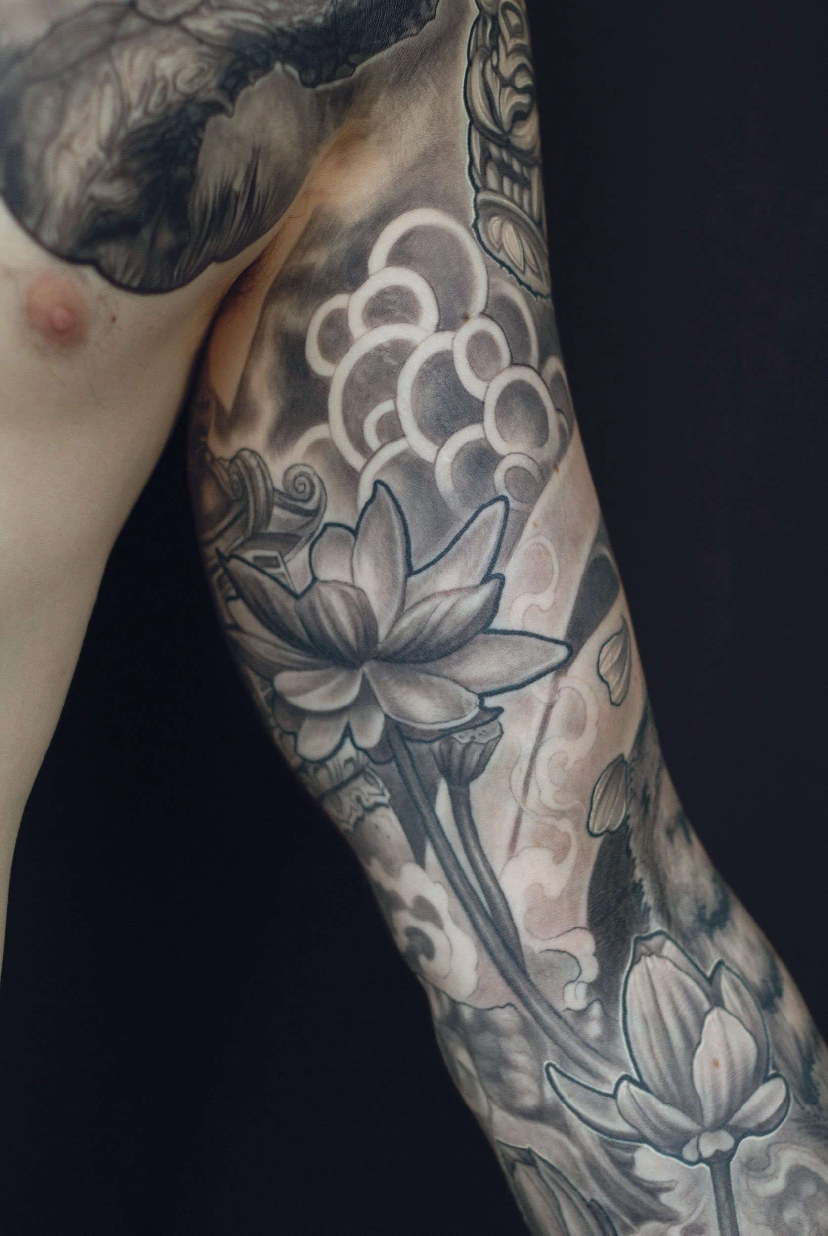 22.4 cheko-inner-lotus-sleeve-tattoos.jpg