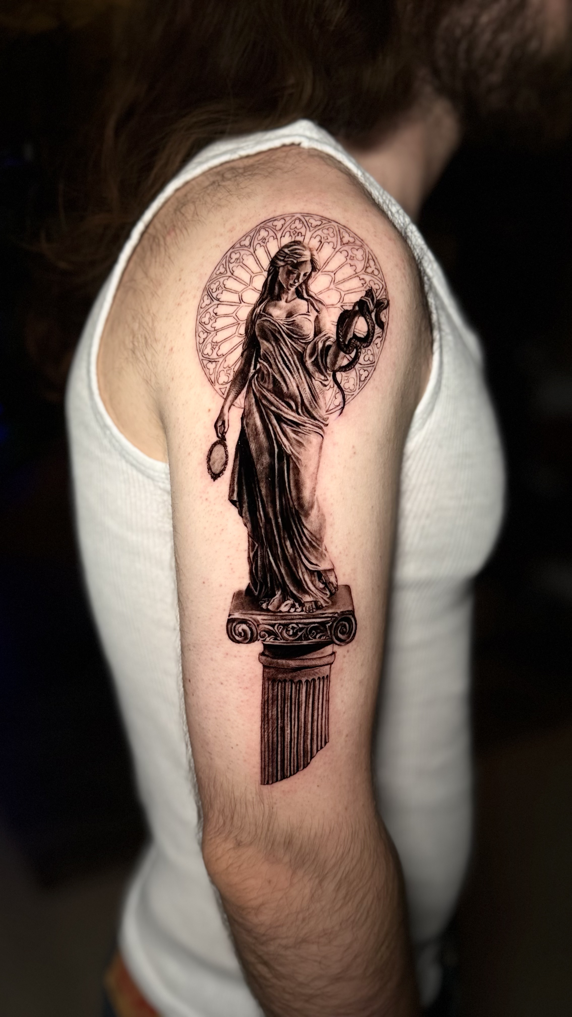statue tattoo