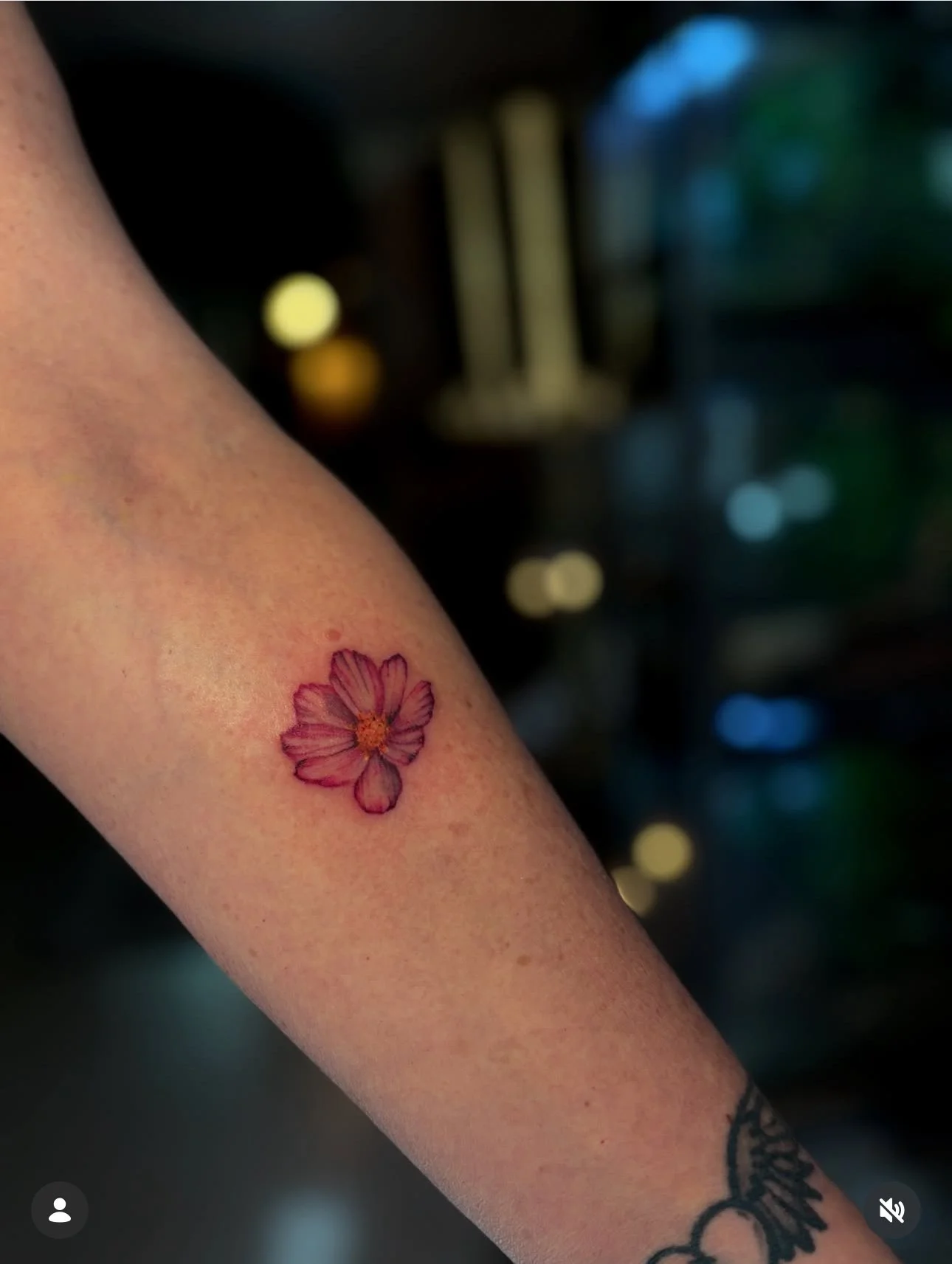 small flower tattoo