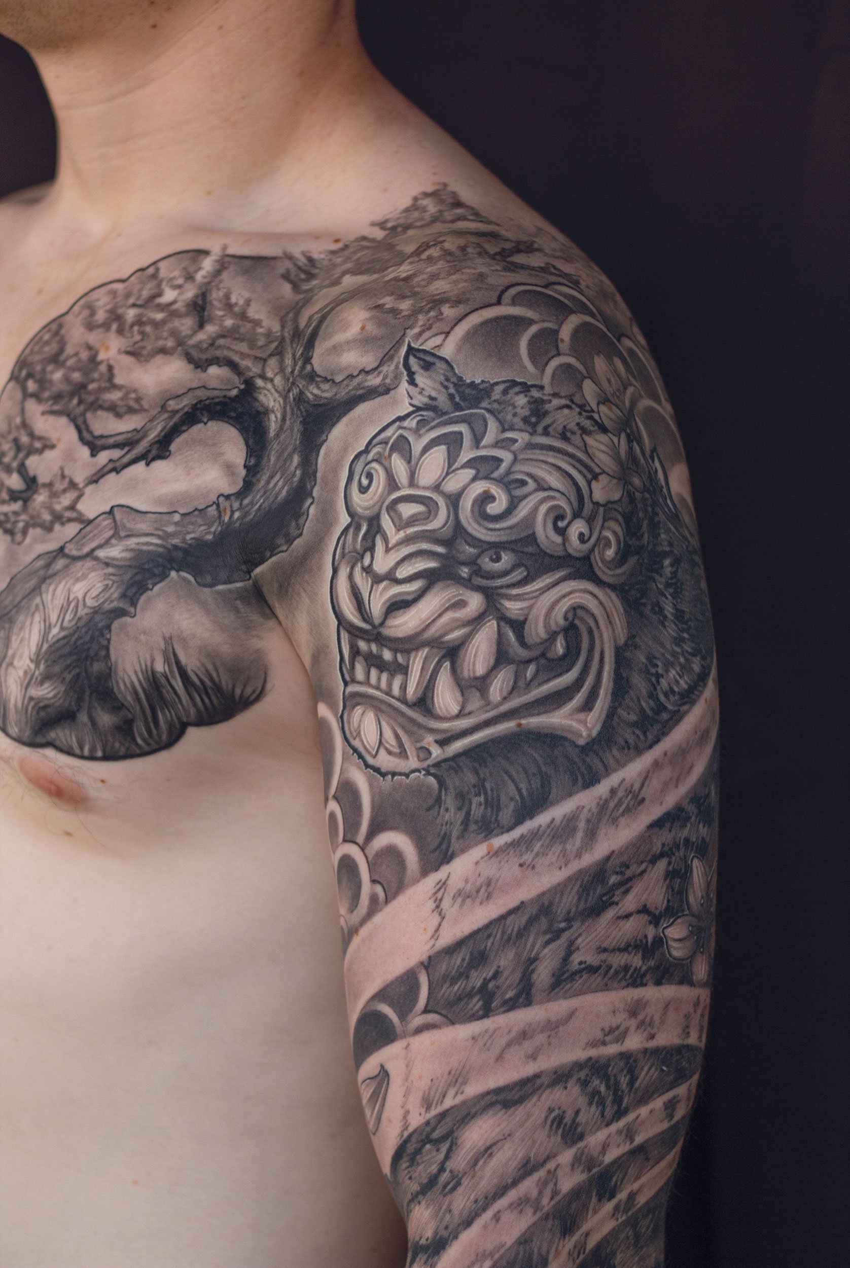 22.2 cheko-ornamental-tiger-face-sleeve-tattoo.jpg