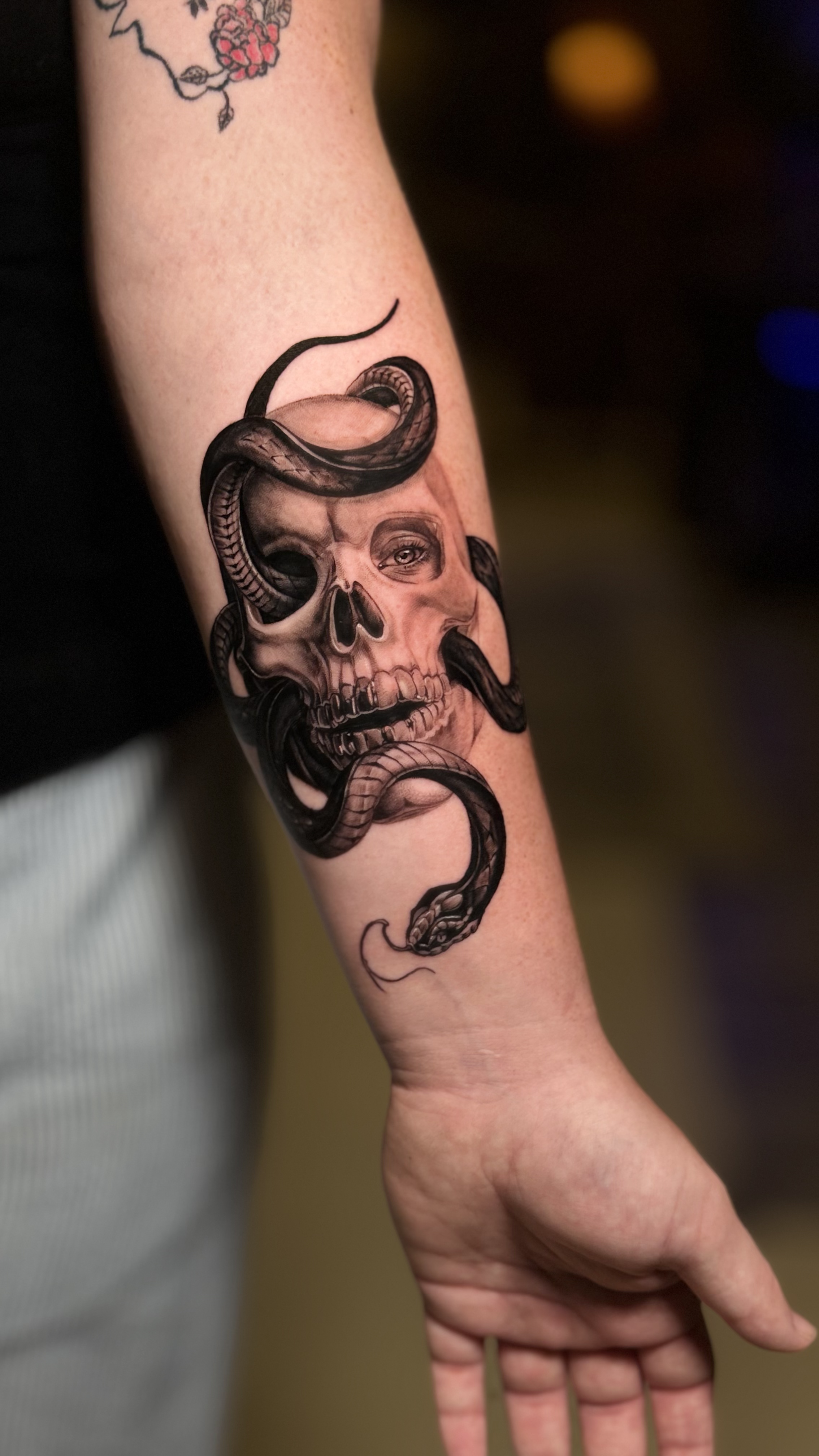skull and snake tattoo