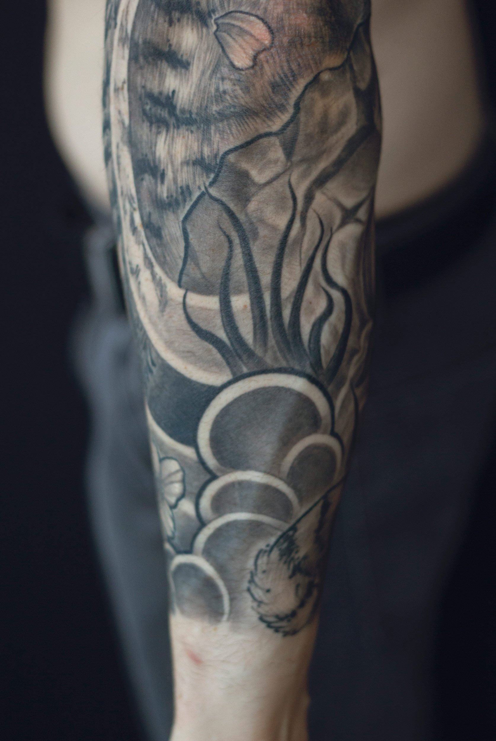 22.6 cheko-pedals-waves-sleeve-tattoo.jpg