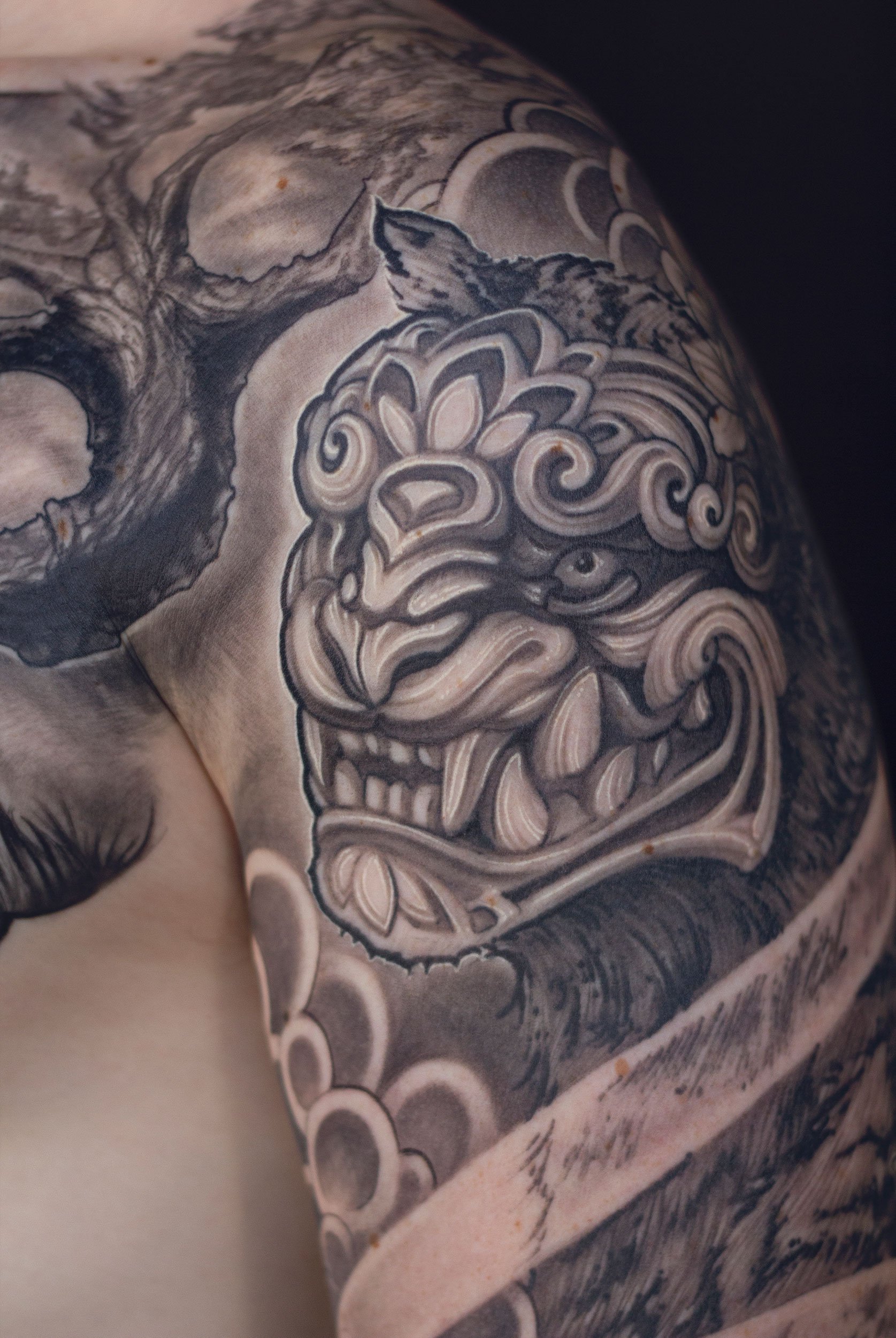 22.1 cheko-ornamental-tiger-clouds-sleeve-tattoos.jpg