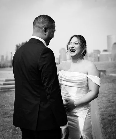 Emotional first look moment at Liberty State Park wedding with NYC skyline