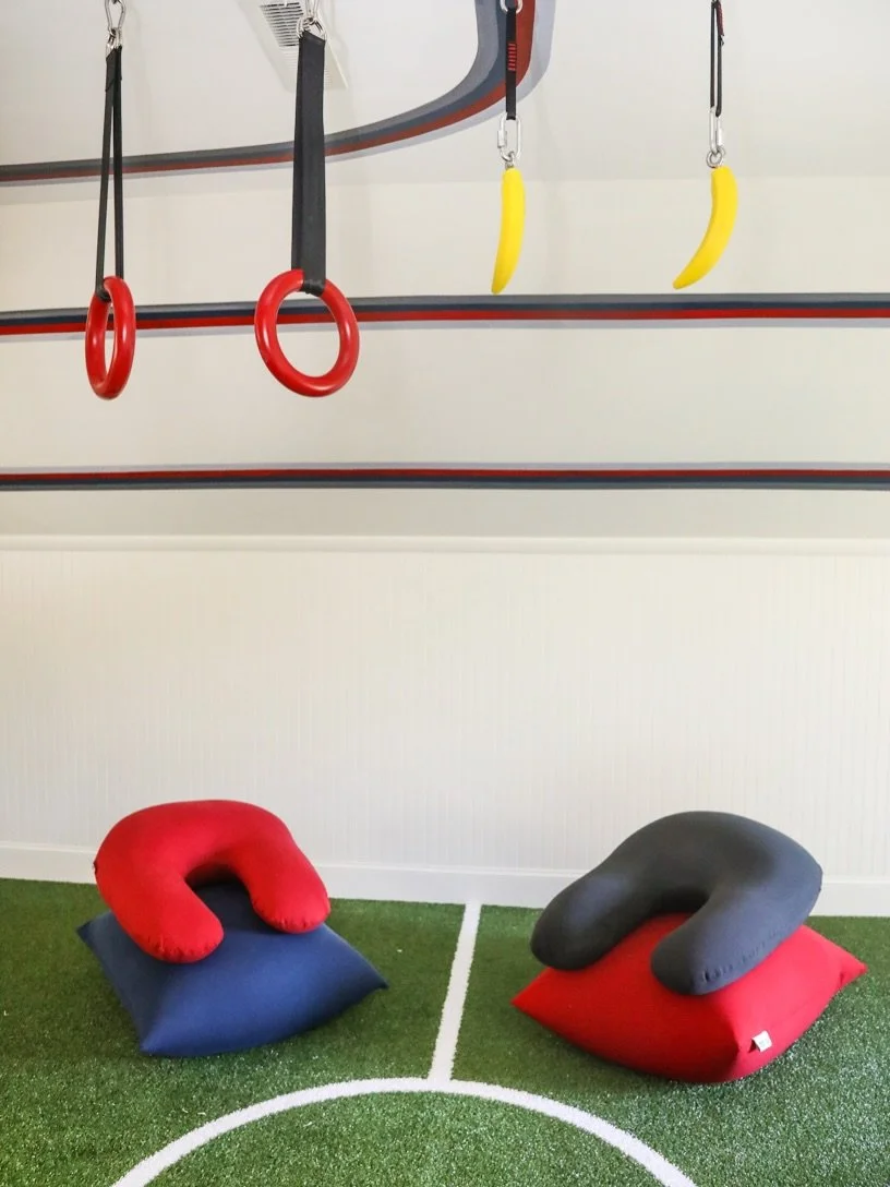 Super Bowl meets the Olympics in here &mdash; play hard, tumble soft, and let the games begin! 🏈 ⚽🏂