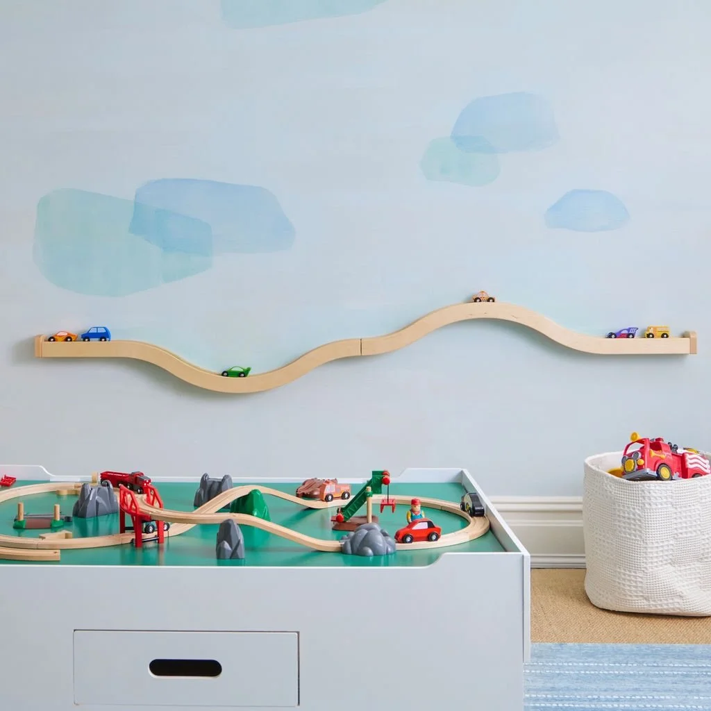 Cruising toward the weekend! 🚗

This Westport playroom features one of our favorite details: a wall track for all those @hotwheelsofficial cars you inevitably collect as a boy mom 🤣

The cars might not be the aesthetic, but this track sure is! 

Fo