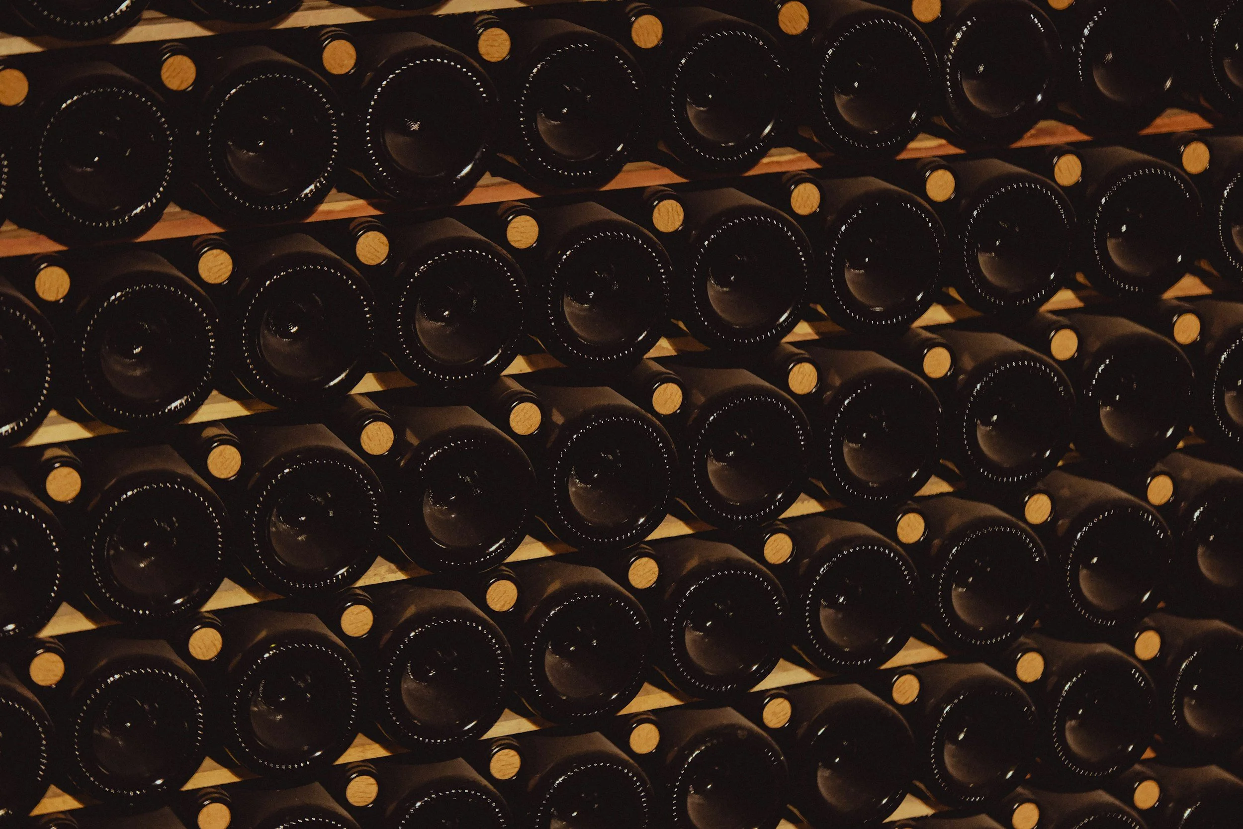 wine bottles on a rack