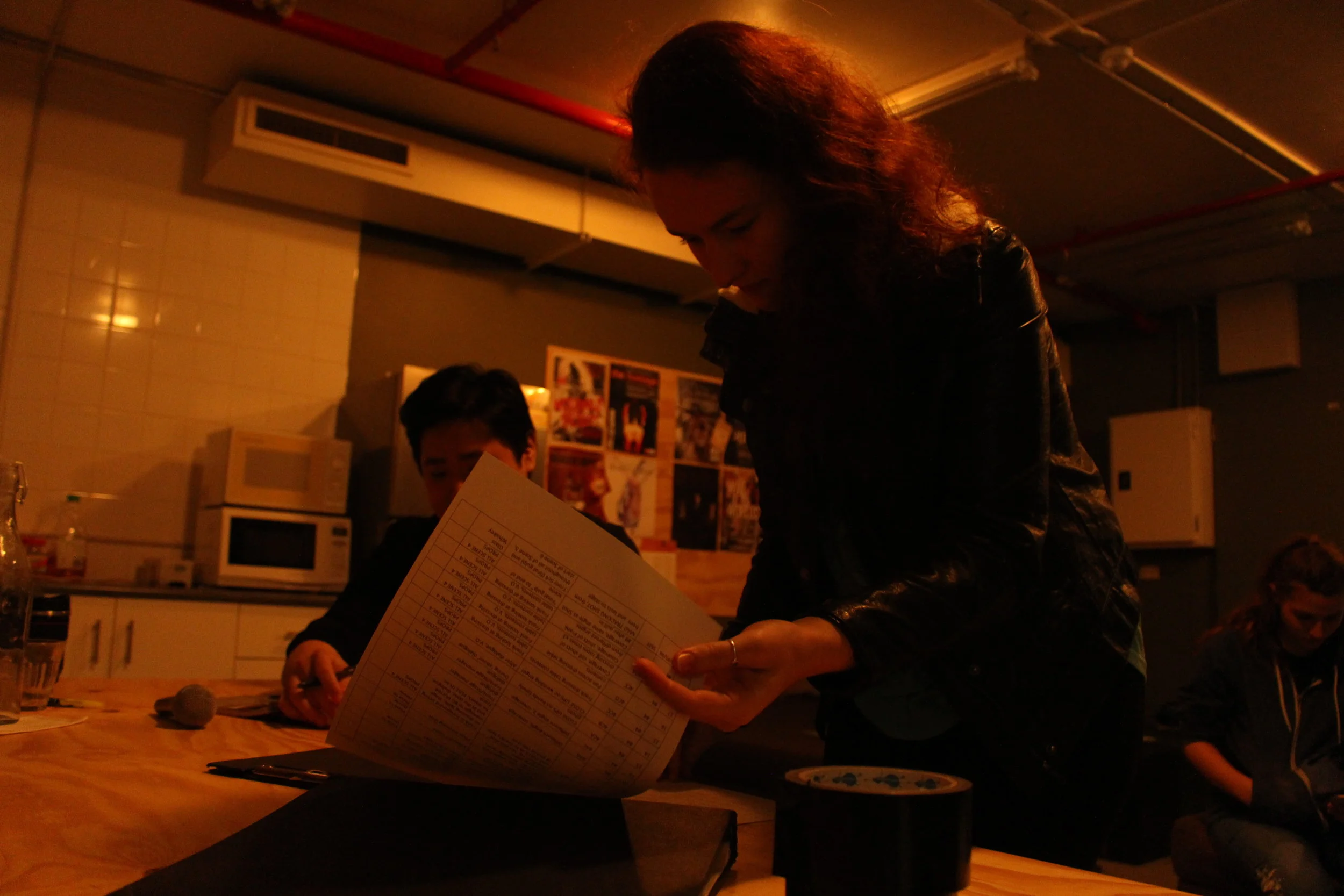  Jason Kim and Kirralee Martin (Additional Crew) check the table for the shot list (2)     