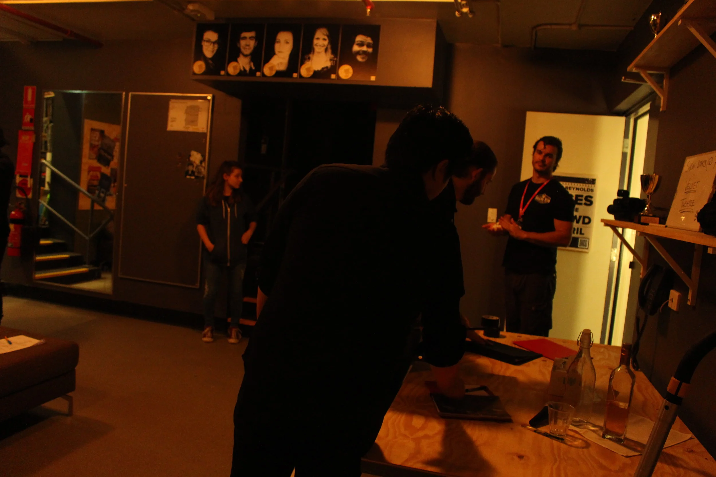  The crew use the table in the corner as a means to hold equipment and papers     