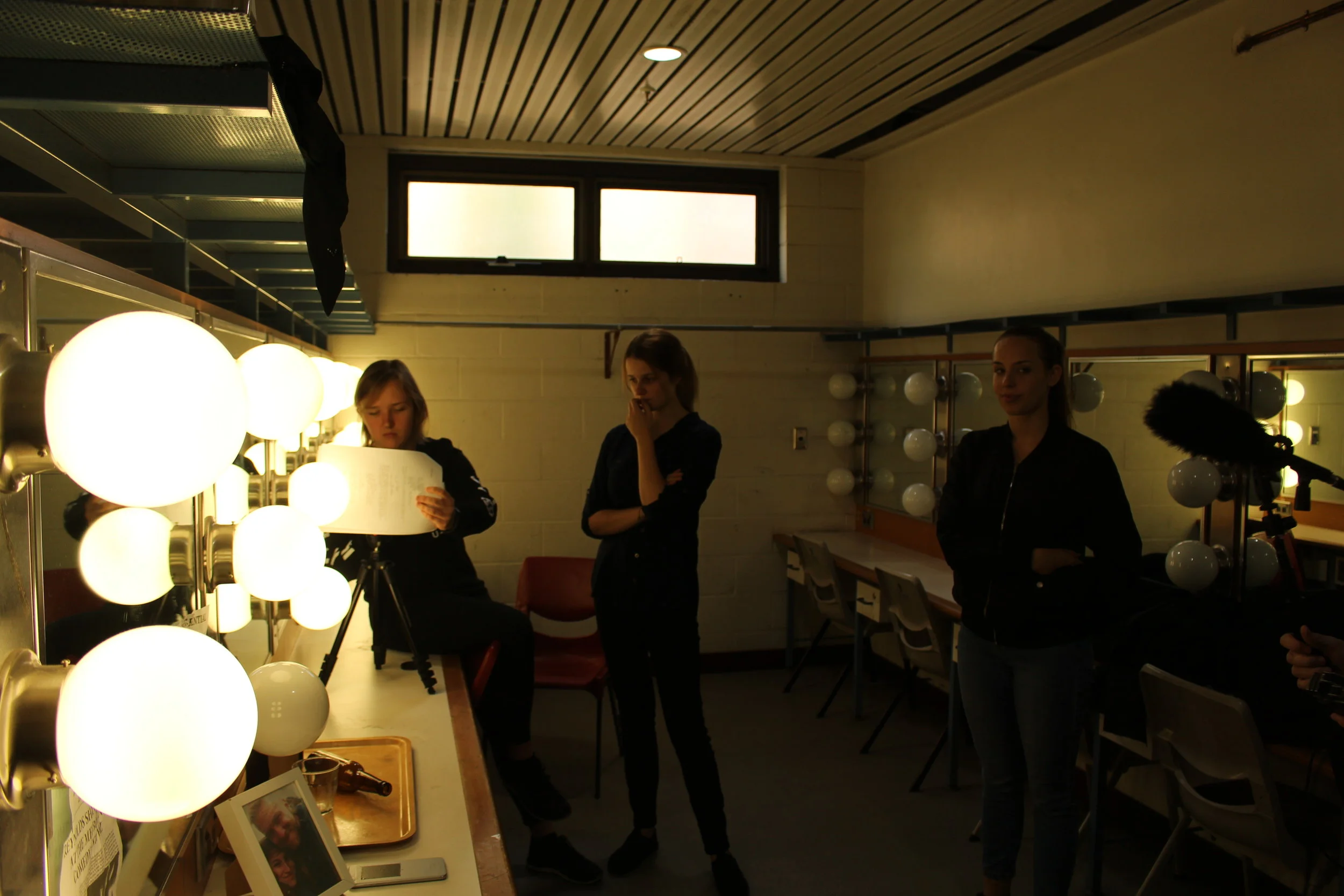  Szalina Maass (Cinematographer), Abbey Kind (Additional Crew) and Chloe Holmes (Producer) prepare a shot     