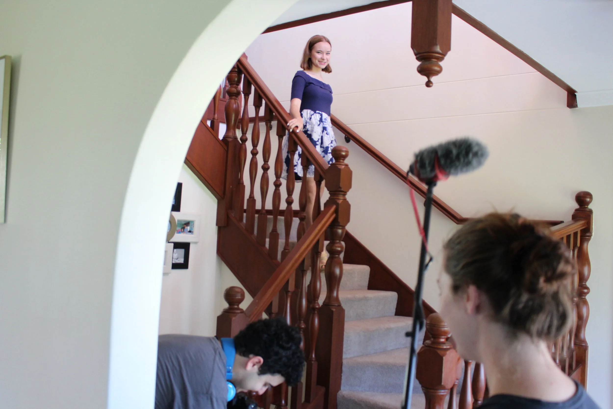  Behind the Scenes: Bethany Tandy as Zoe comes down the stairs 