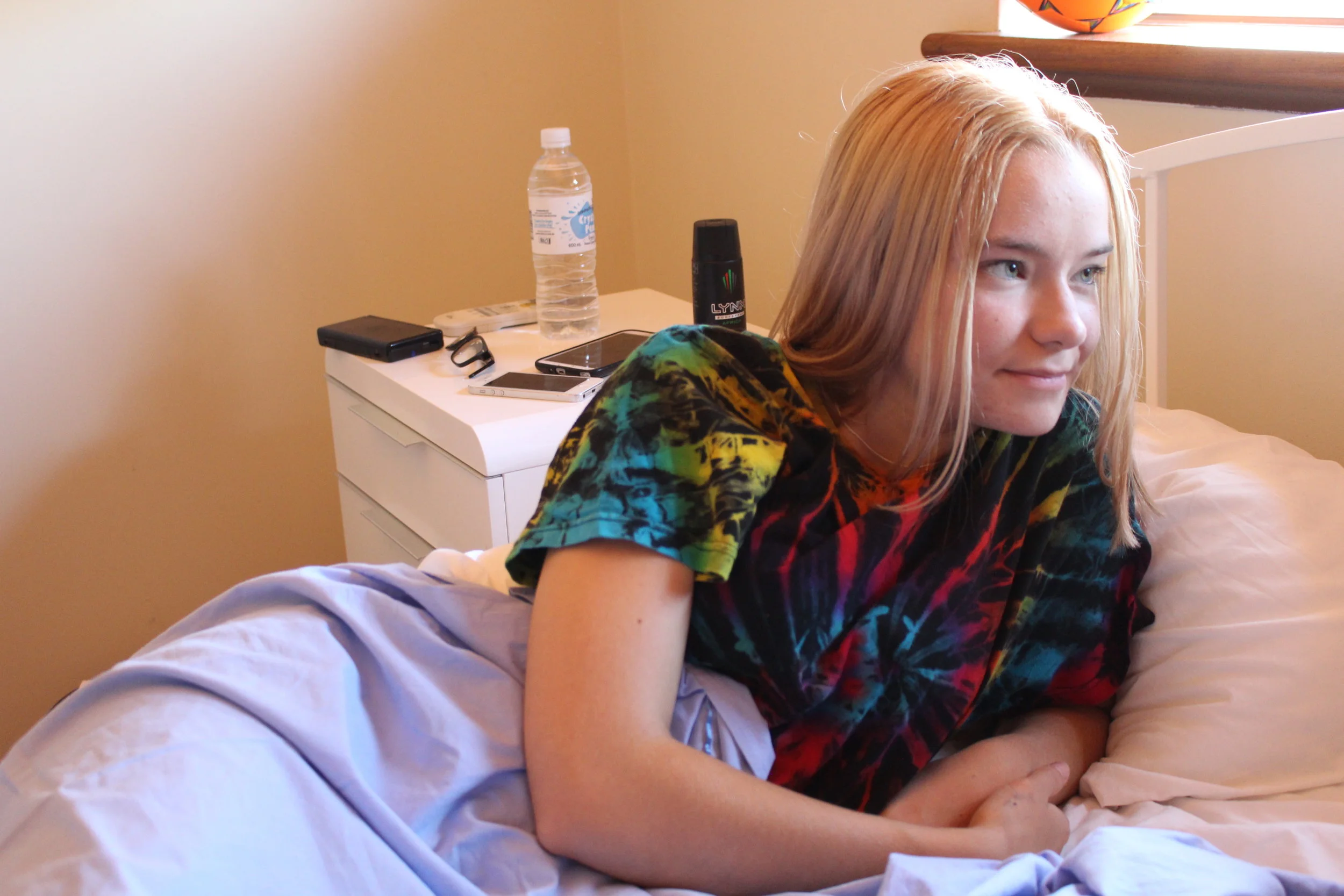  'Zoe has concerns as she lays in bed.' 