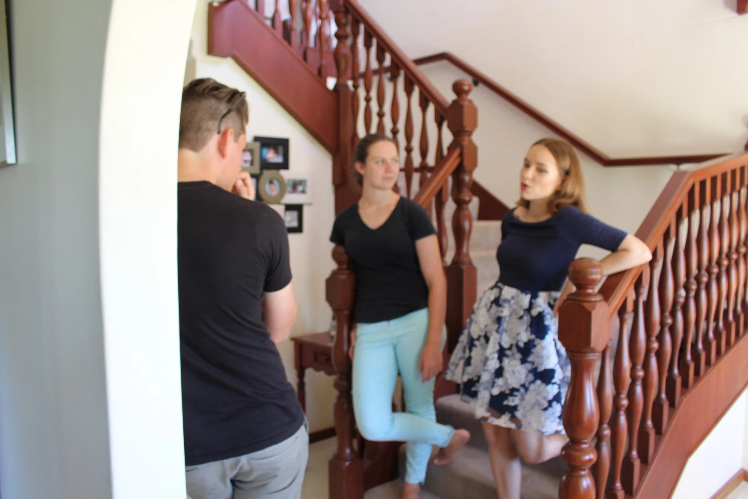  Behind the Scenes: The cast and crew take a minute break 