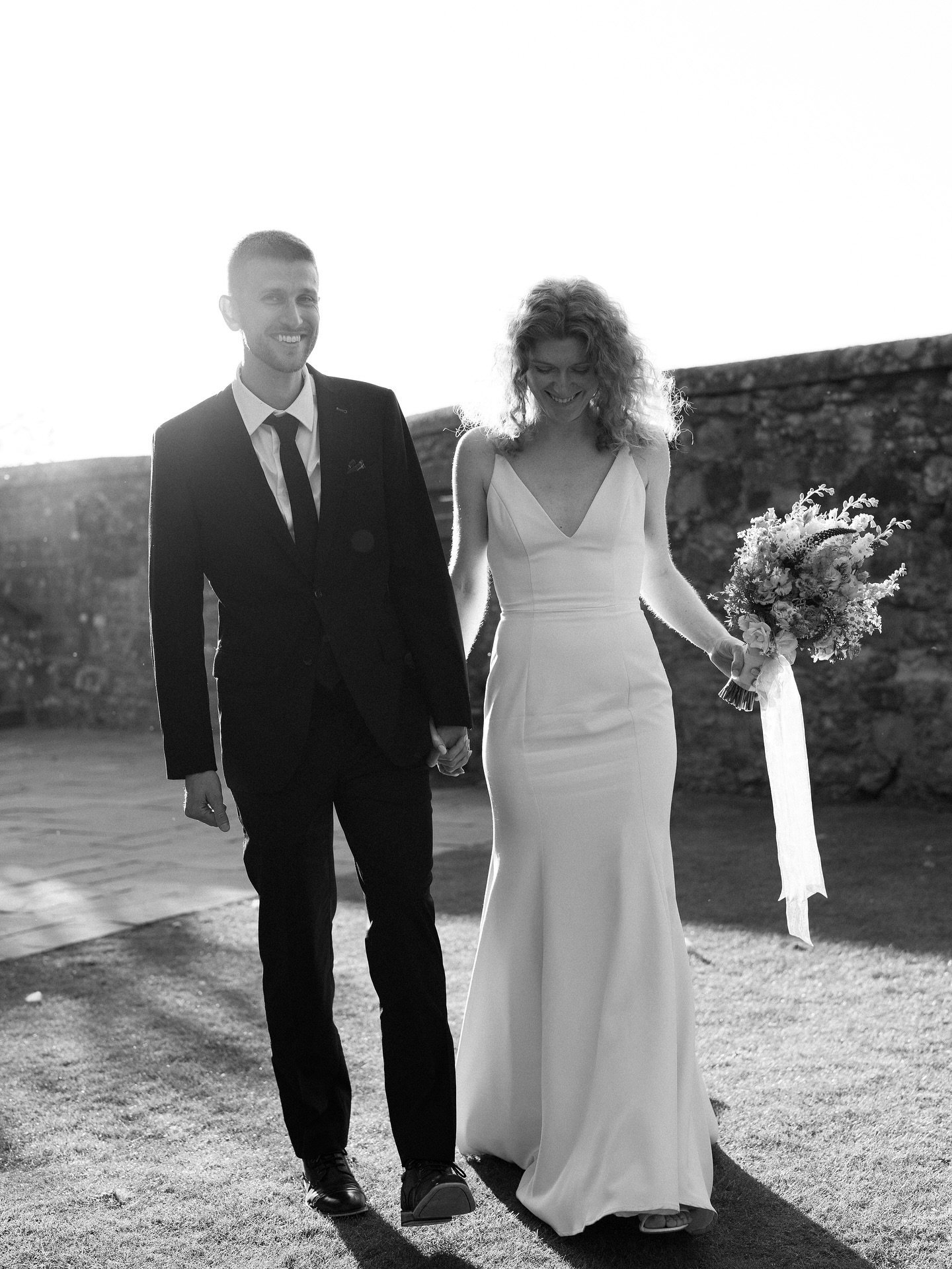 Scottish weddings tend to be beautifully relaxed, heartfelt, and deeply personal. Couples embrace the day as it unfolds &mdash; whether that includes spontaneous laughing fits, wind blowing through hair, or a quiet moment shared away from the crowd.
