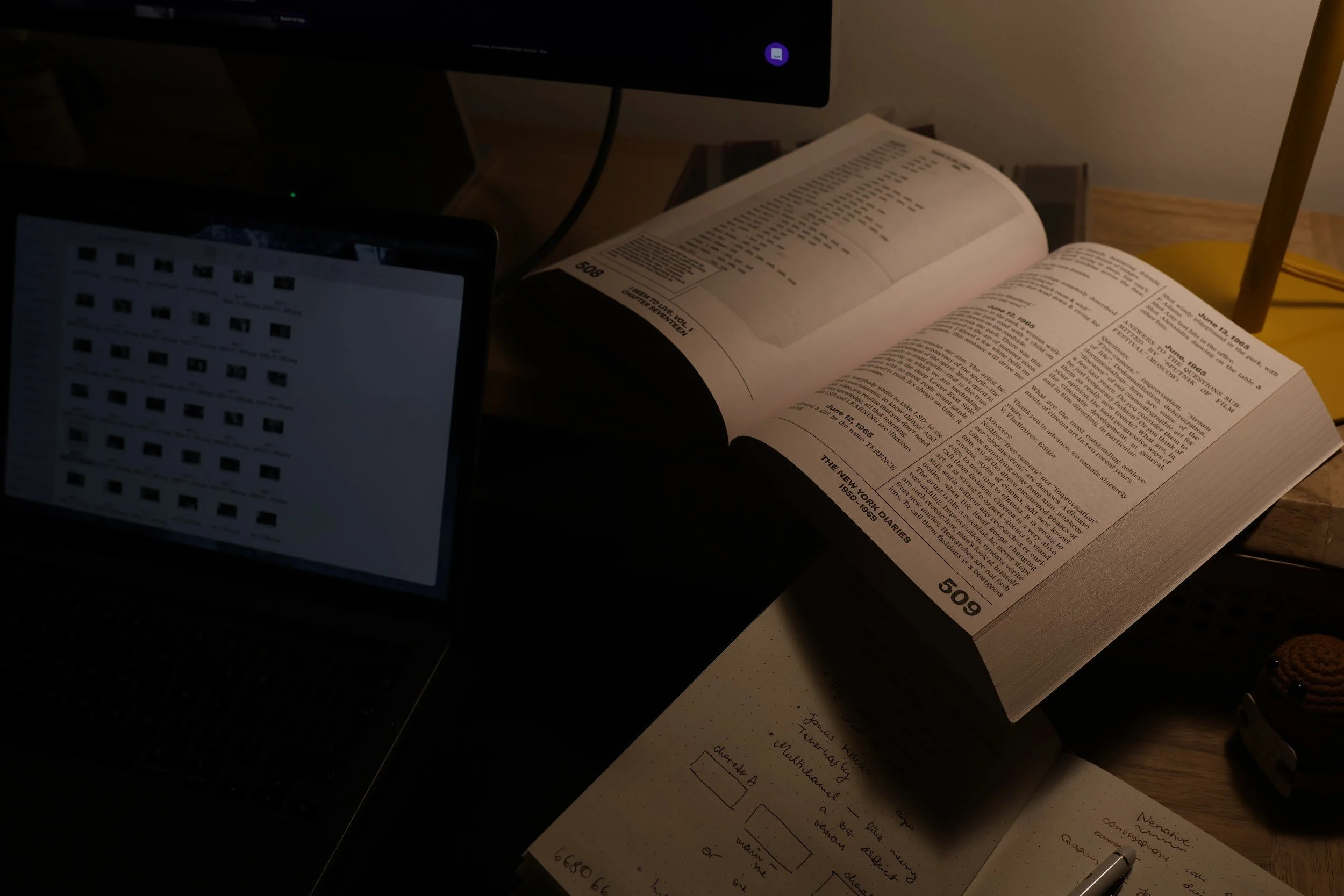 Ivona Tau's studio: research notes and an open book beside her screenMeeting the Sky by Efdot, a Cities // Paris limited edition from the official Art Basel Paris 2026 collection, framed on a gallery wall