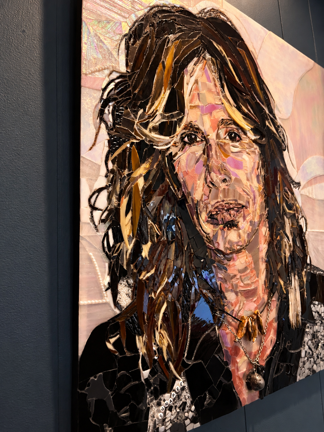Handmade Steven Tyler Aerosmith fused glass portrait featuring detailed multicolor glass, dark hair, and an iridescent background