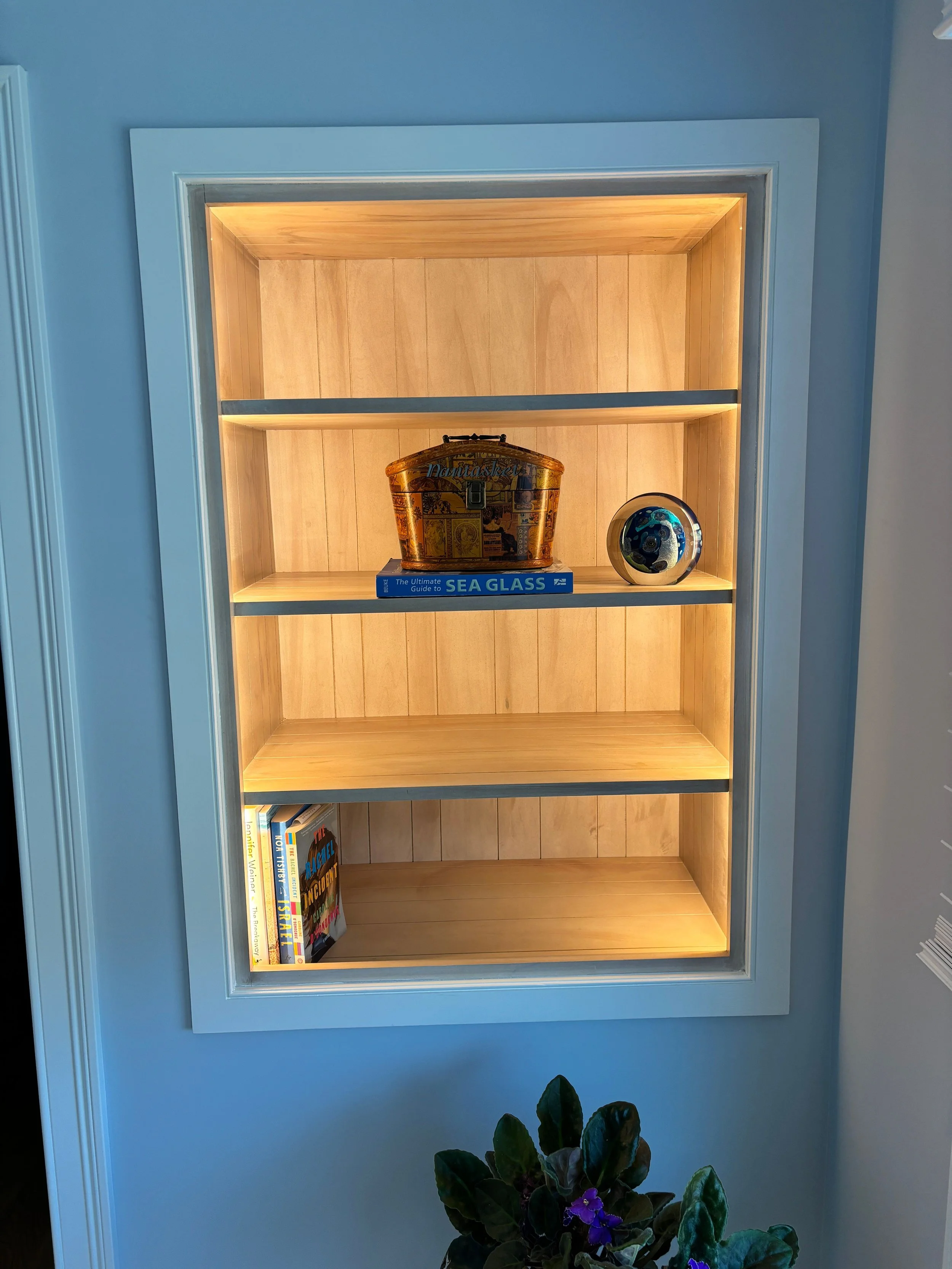 Lighted small shelving built in.jpeg
