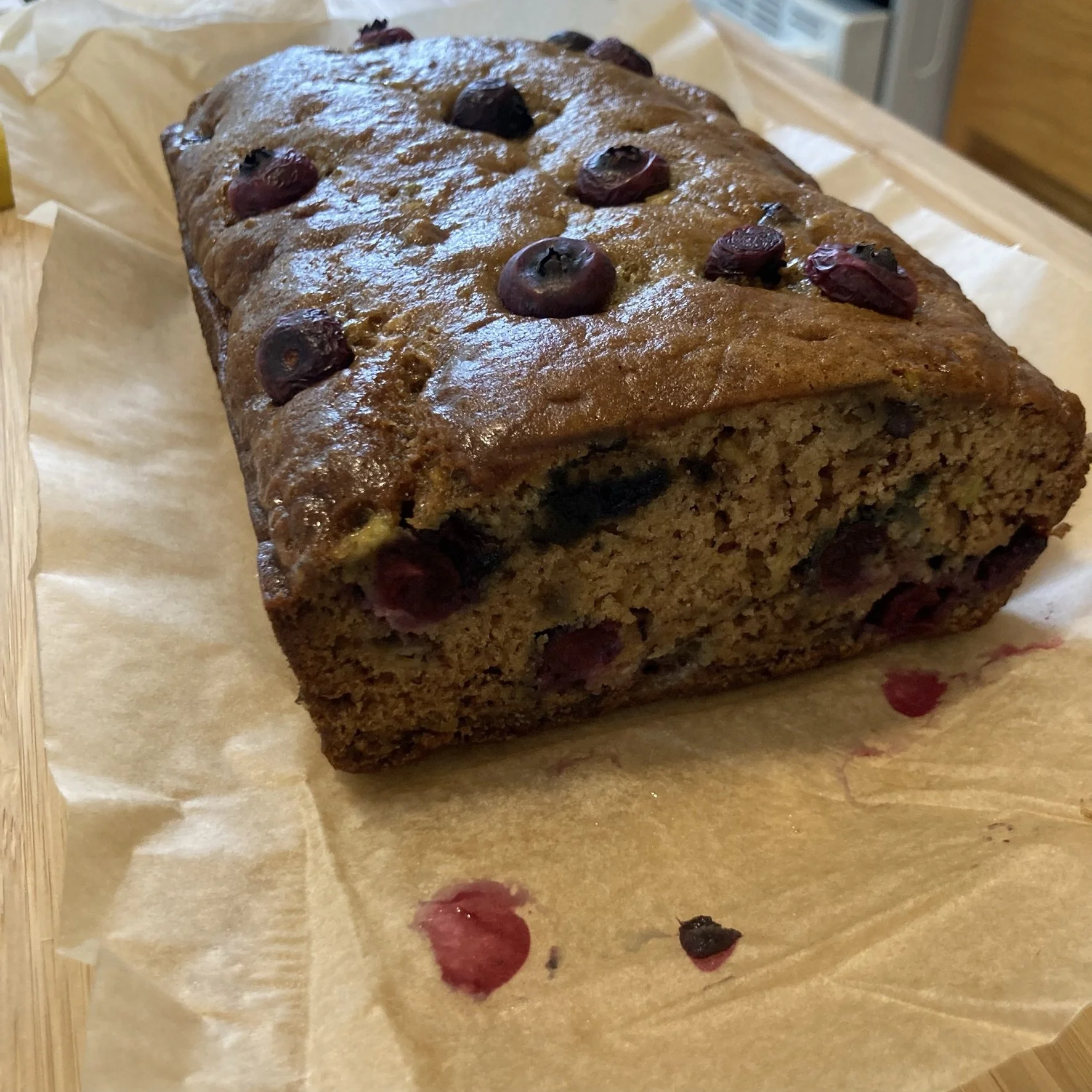 Banana bread made with plant-based protein powder, avocados and blueberries