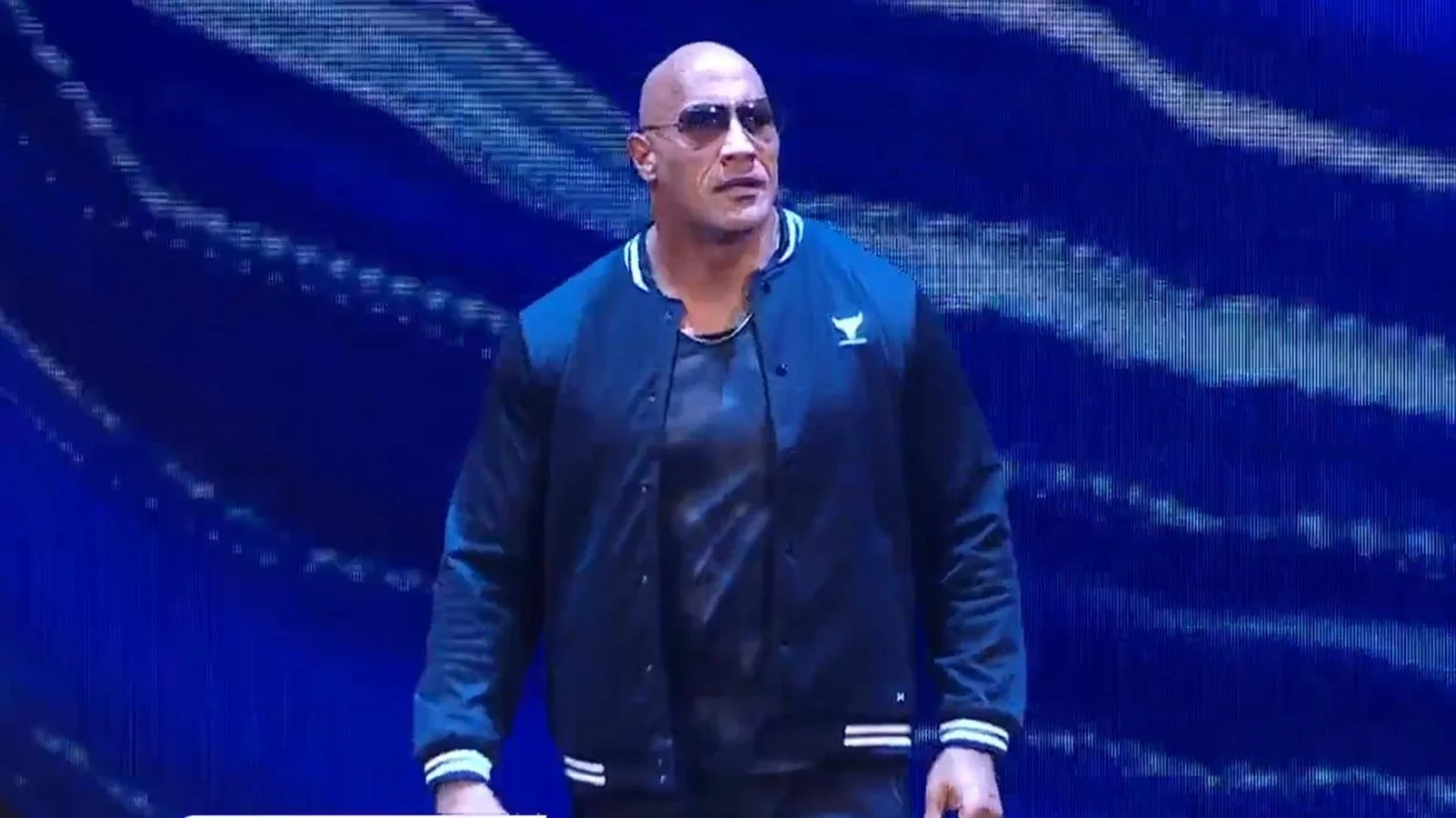 The Rock on WWE Smackdown in the SS23 Mesh Varsity Jacket, September 2023