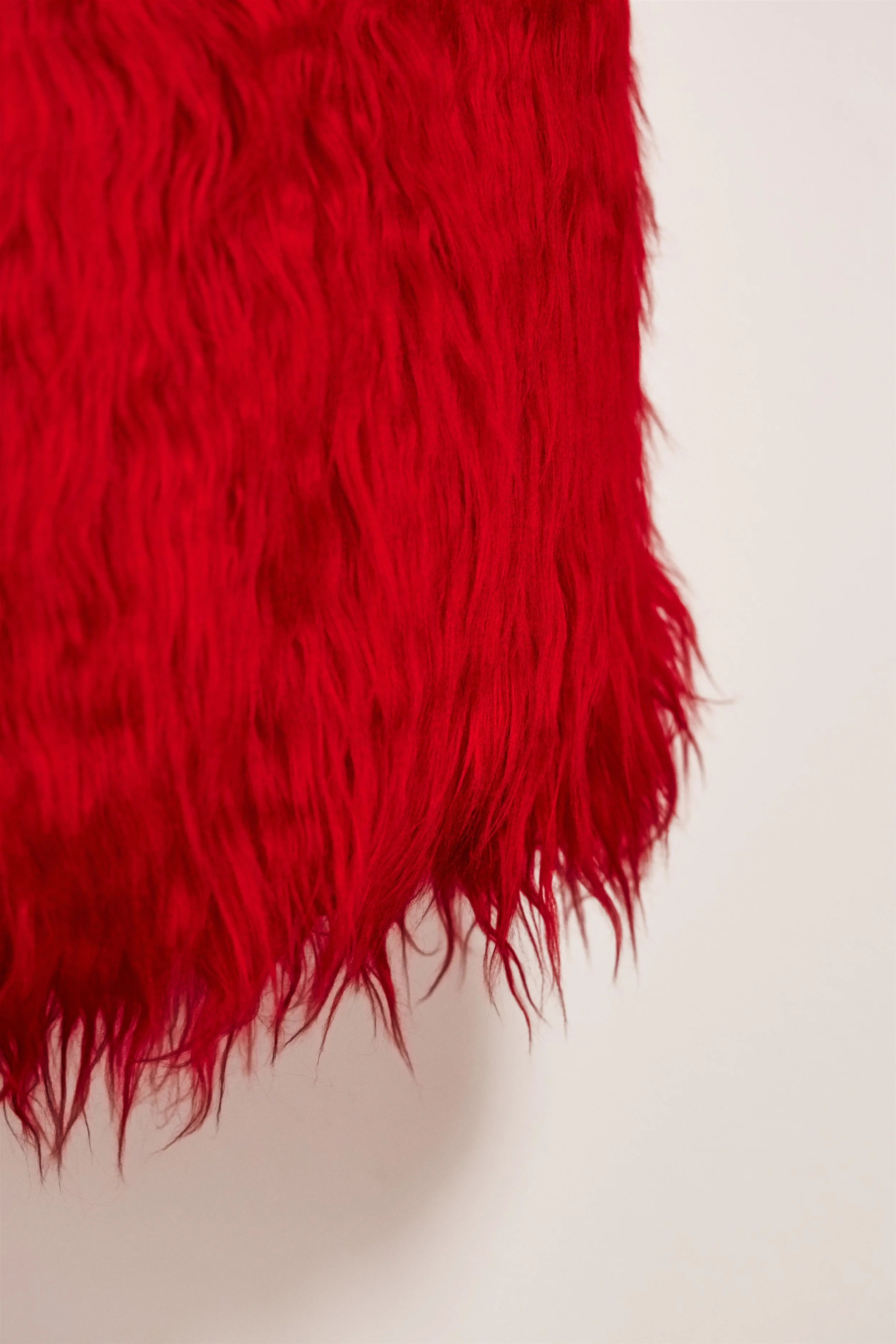 Hem detail of red faux fur midi skirt — Pretend to Sheep by B.Brand