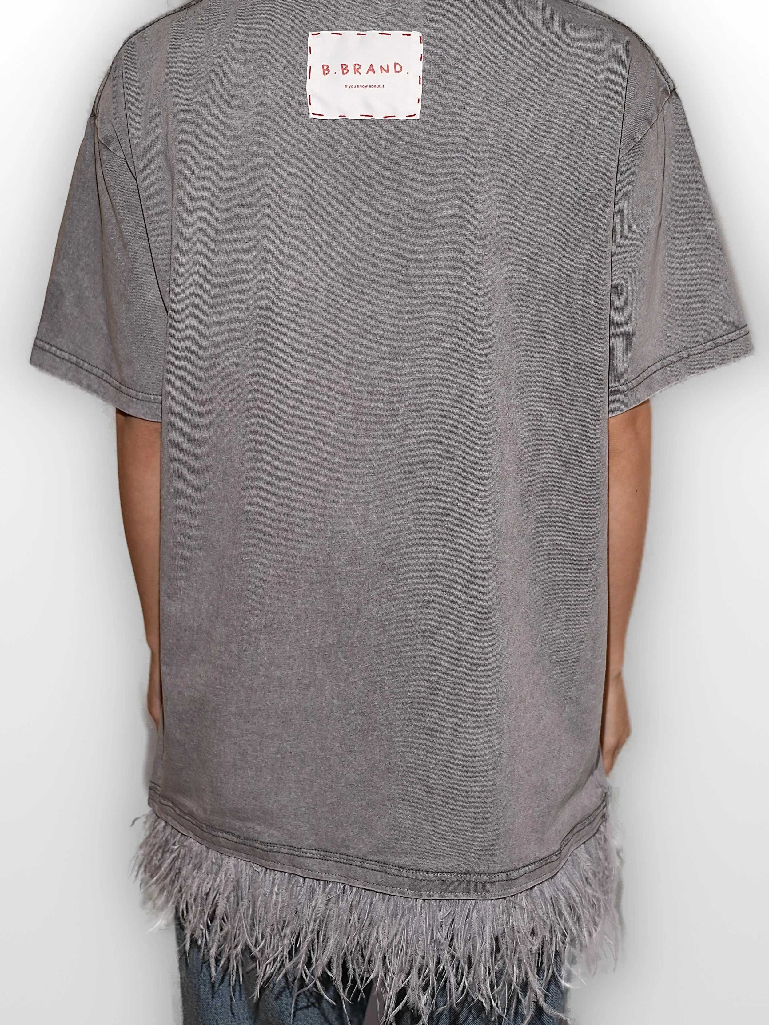 B.Brand Gray Feather T-Shirt -- three-quarter view: washed cotton, feather trim detail