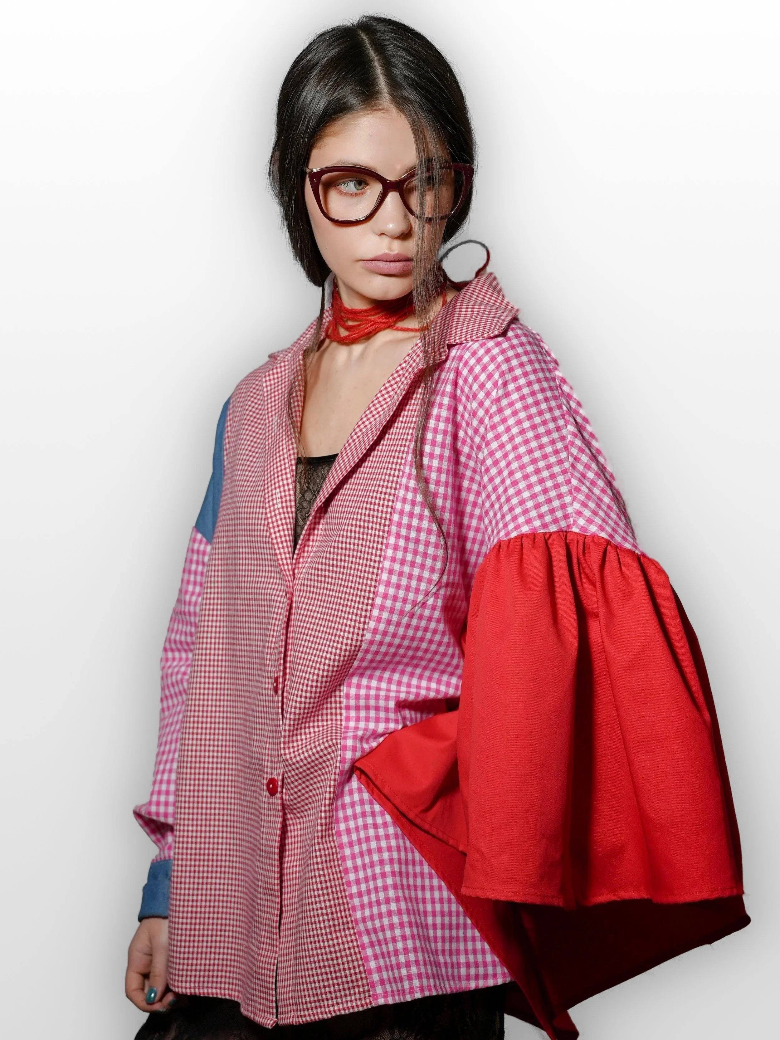B.Brand Red Wave Shirt — front view: oversized gingham cotton with sculptural red wave ribbon detail
