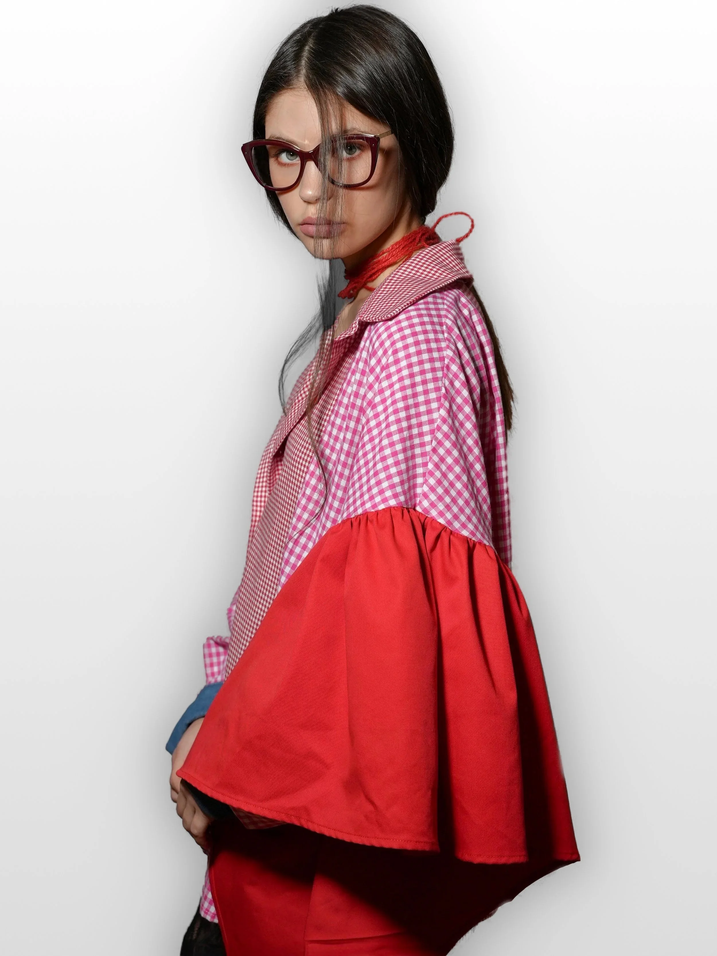 B.Brand Red Wave Shirt — side view: red wave ribbon movement, relaxed silhouette
