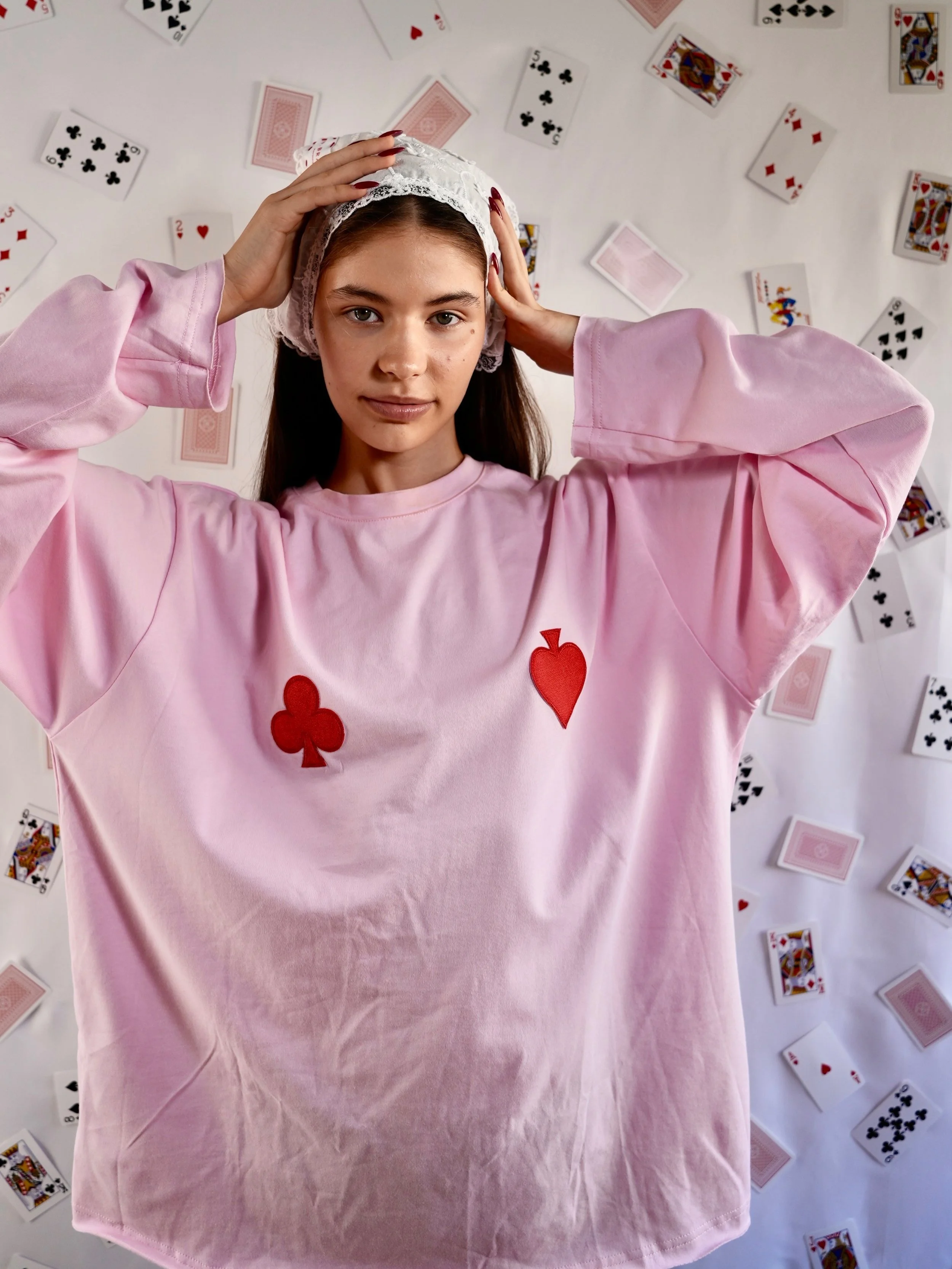 B.Brand Marshmallow Red Cards Long Sleeve — detail view: red playing card symbols on marshmallow pink