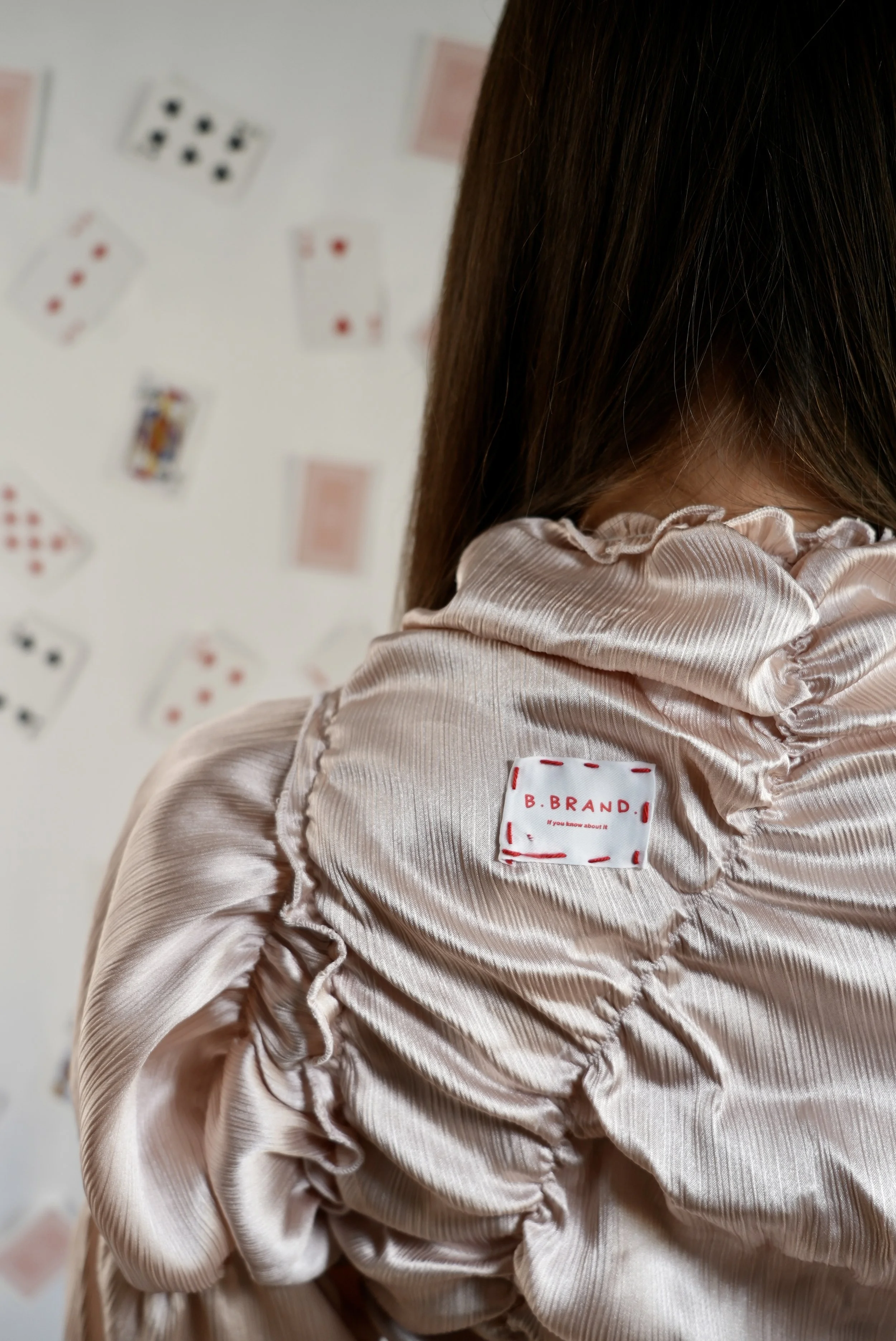 B.Brand Long Sleeve Pinkish Pearl — back view: pearl-toned satin long sleeve relaxed fit