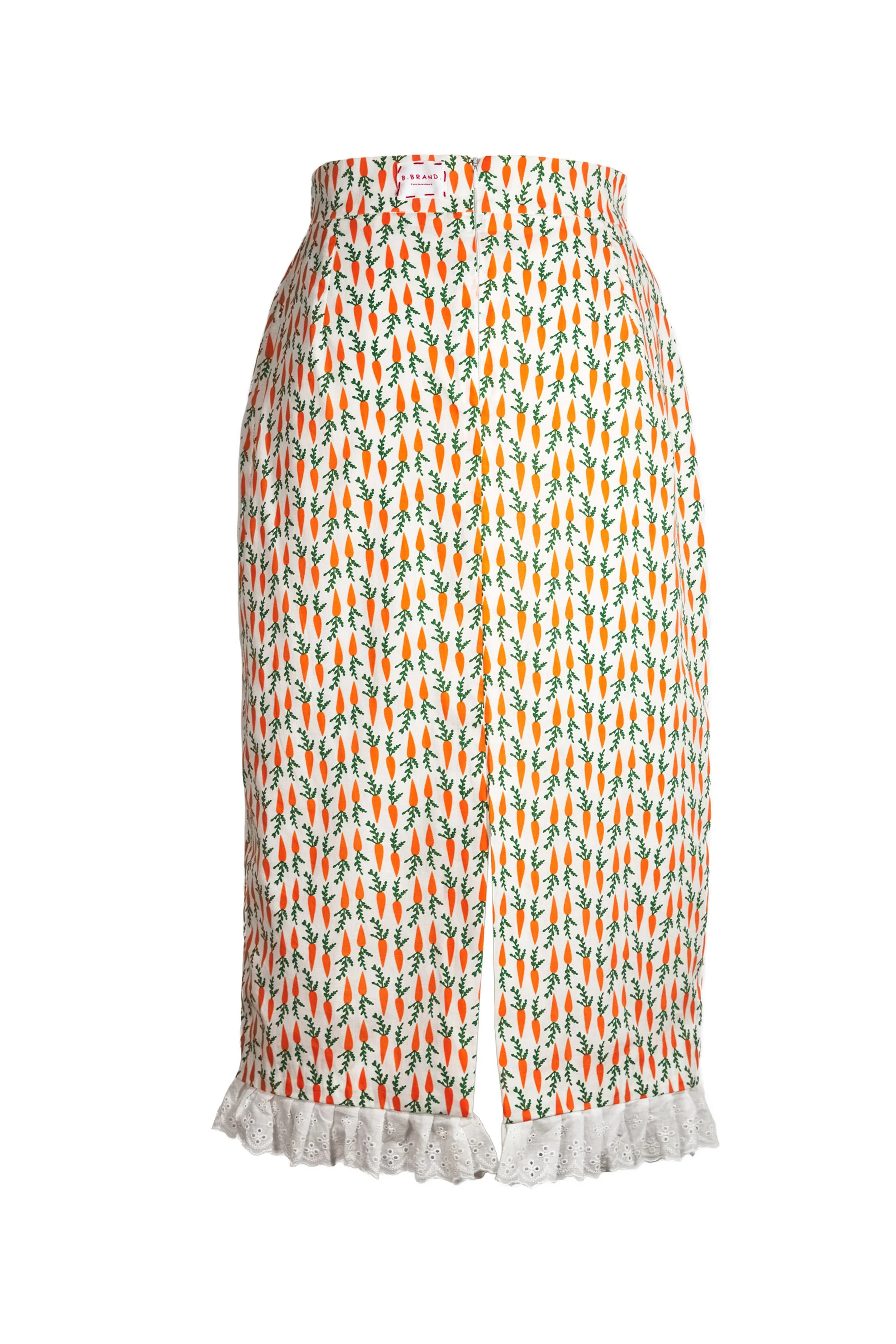 Cream carrot print midi skirt back view showing elastic waistband and eyelet lace hem — Carrot Cake by B.Brand