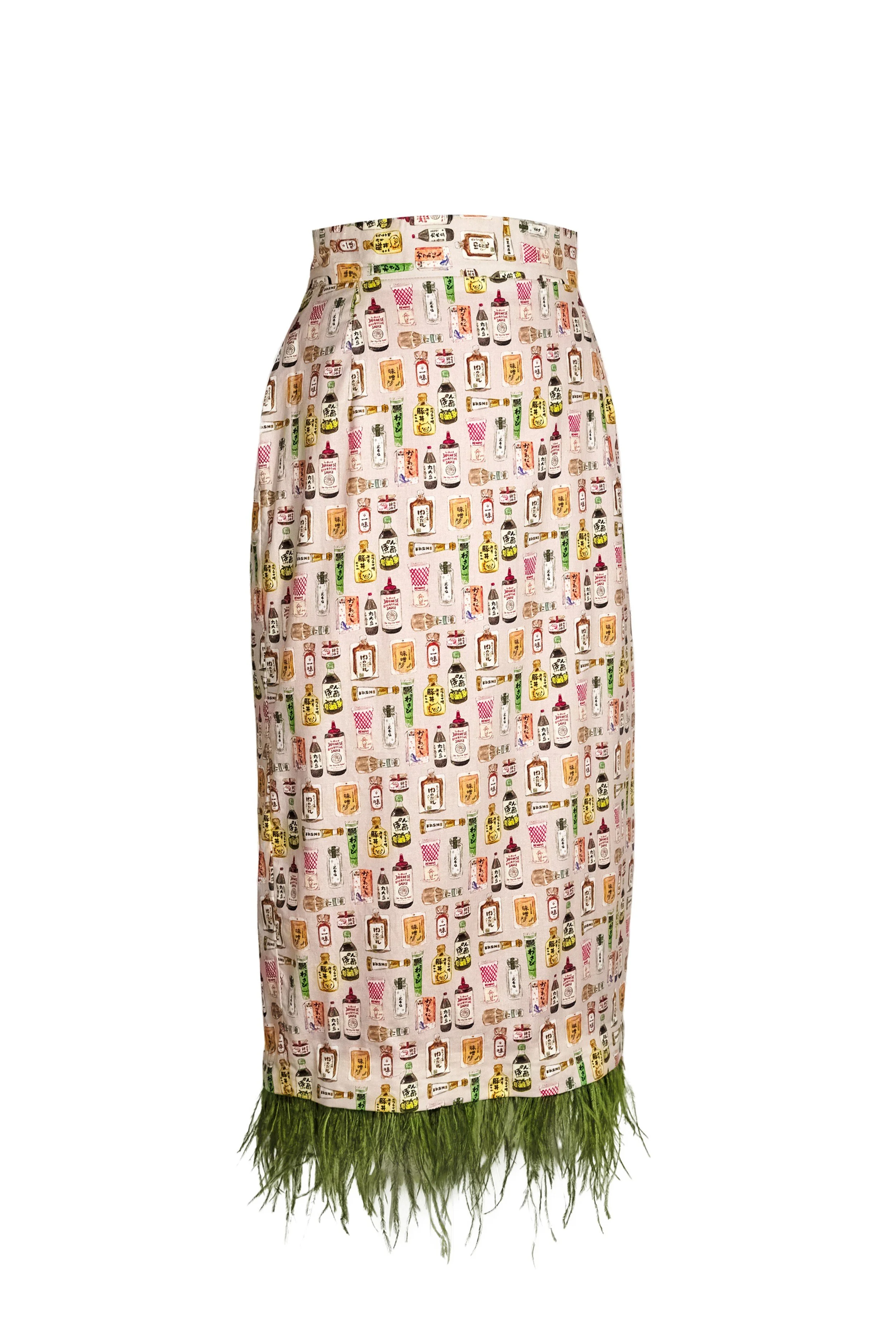 Cream Japanese print midi skirt three-quarter view with detachable wasabi-green feathers — Wasabi Lover by B.Brand