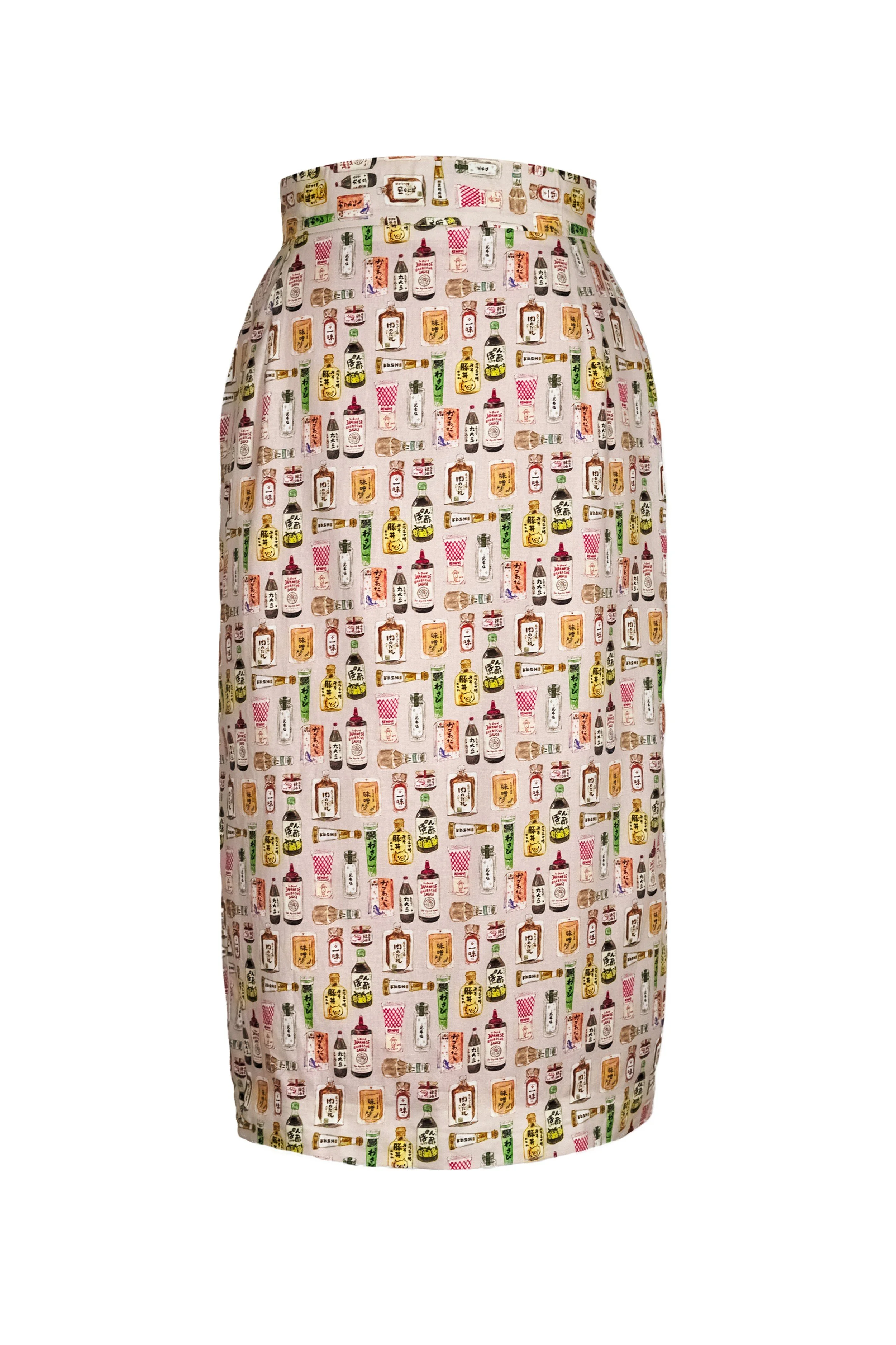 Full view of cream cotton midi skirt with Japanese condiment print and green feather hem — Wasabi Lover by B.Brand