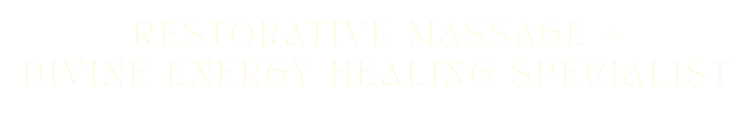 Black sign with white text reading 'Restorative Massage + Divine Energy Healing Specialist'.