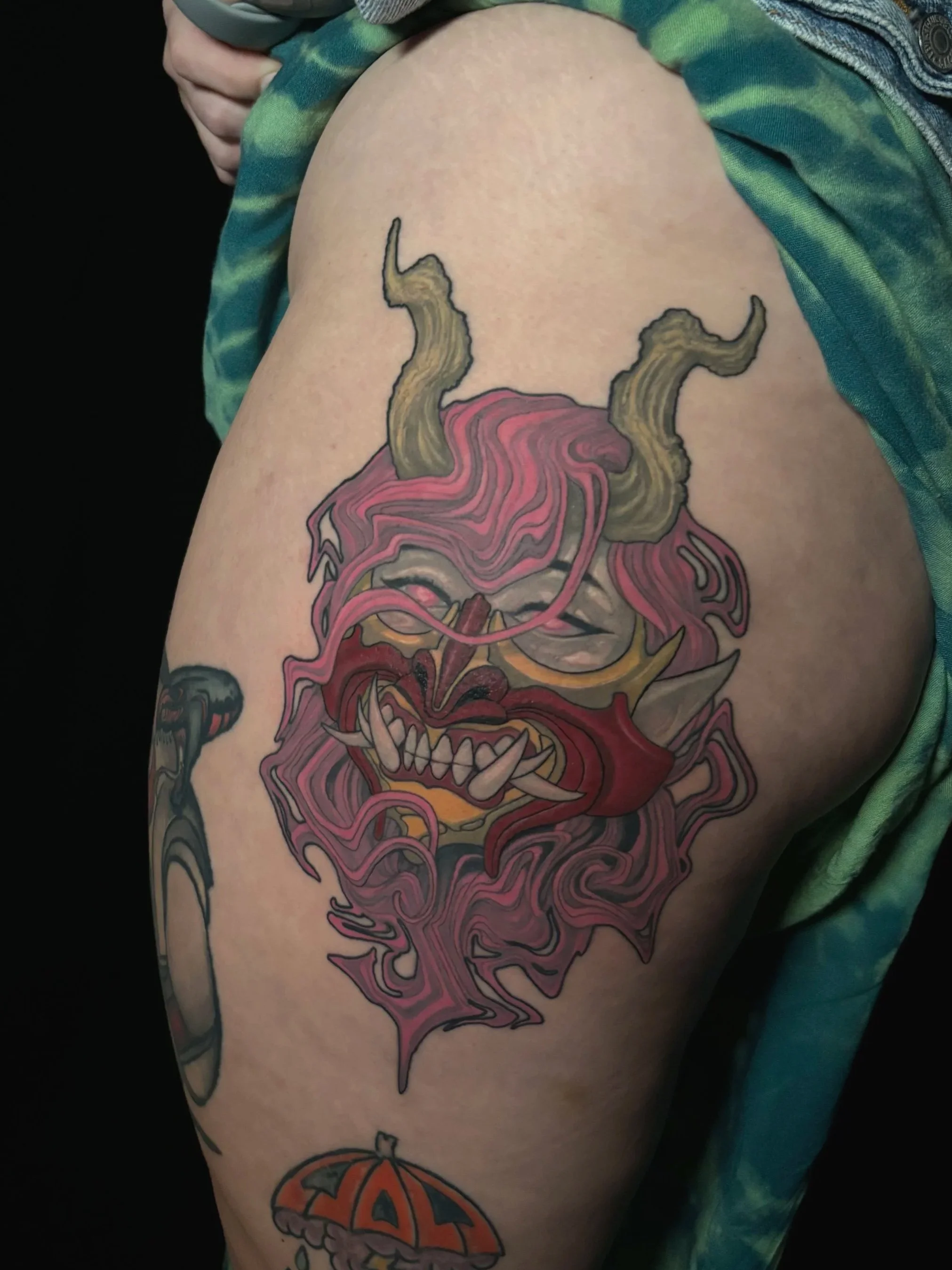 Lady woman face wearing haya mask abstract fluid flowing hair with horns colorful large tattoo detailed beautiful