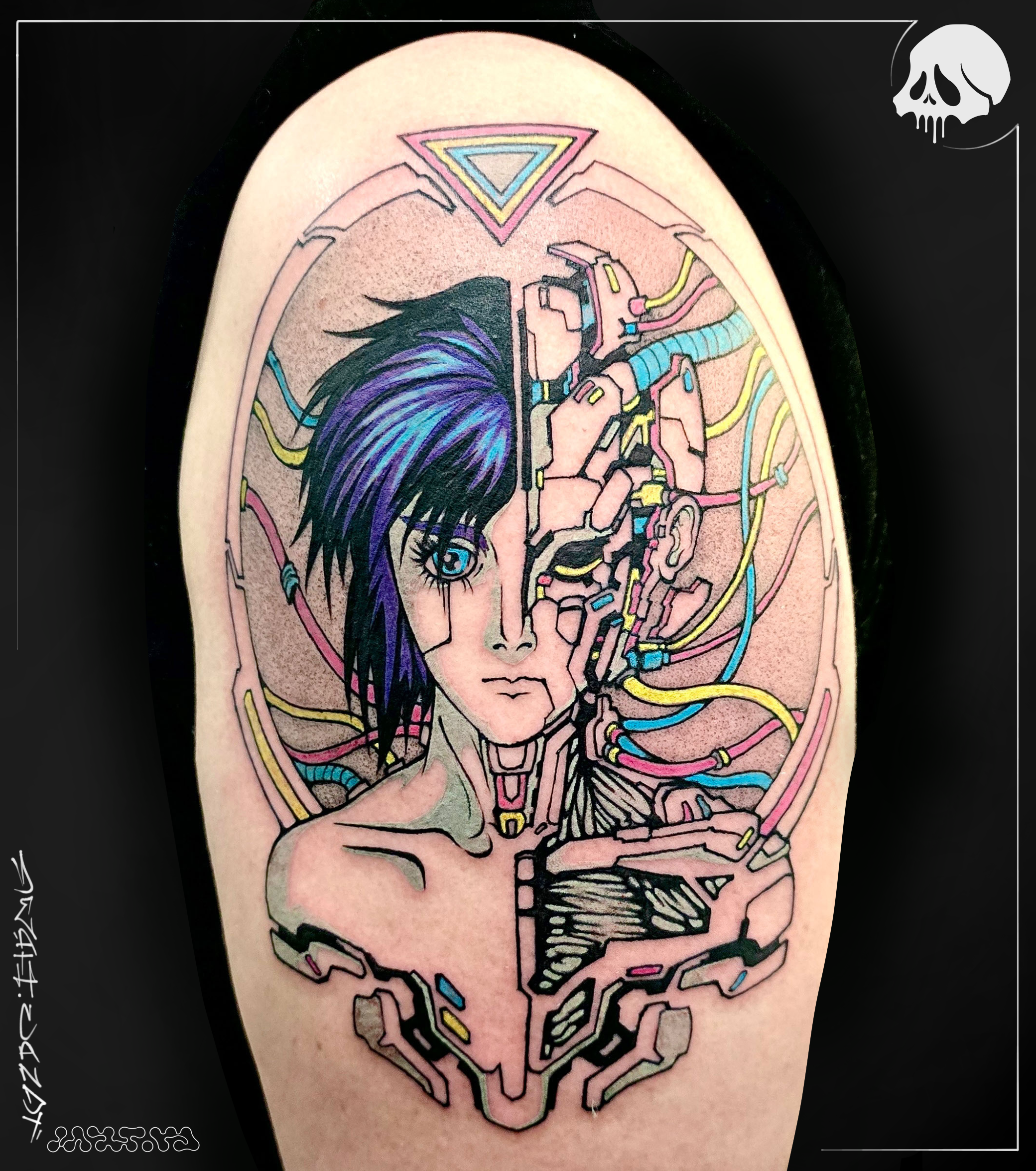 A colorful tattoo of ghost in the shell connor smith deathcandy_art tattoo artist seattle washington.