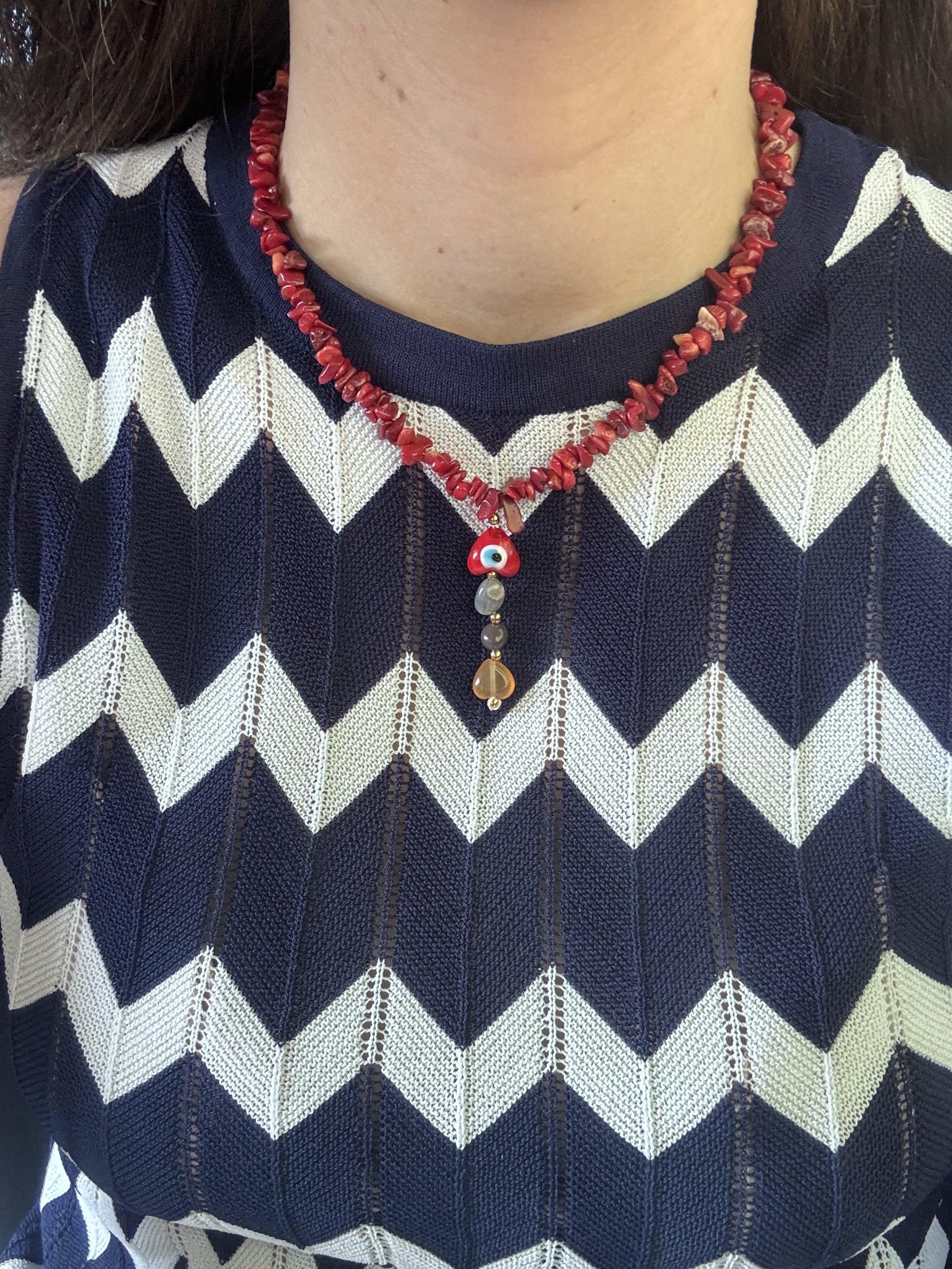 Collar coral ojo