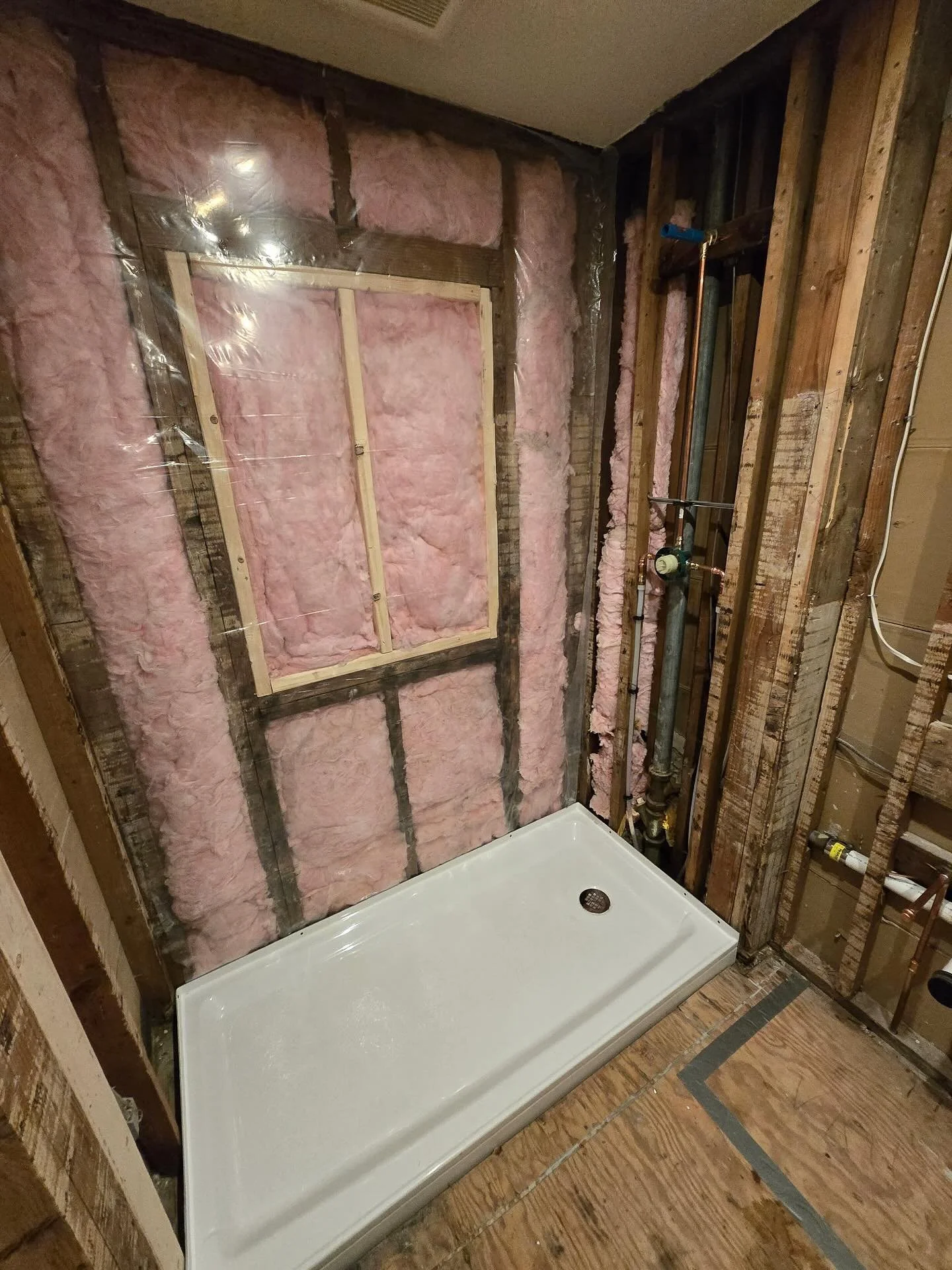 Recent bathroom renovation. We moved existing tub and shower and installed an Oasis brand acrylic based shower and @moeninc shower valve. Reroughed location of toilet and vanity waste line and stubbed out new copper lines for water.