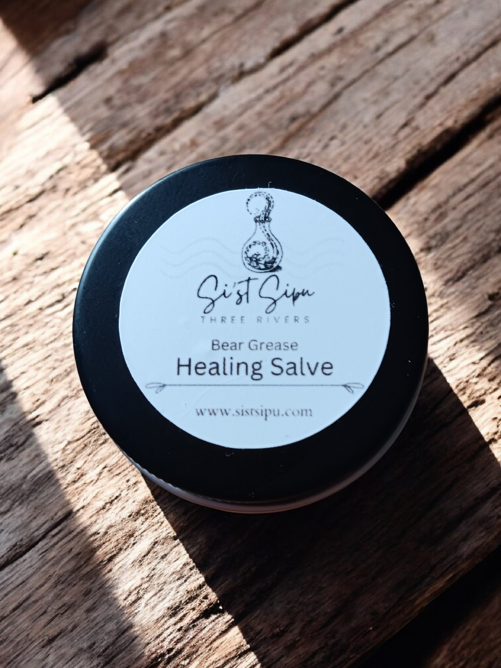 25g bear grease healing salve in metal tin, traditionally used to soothe dry skin, eczema, psoriasis, and joint discomfort