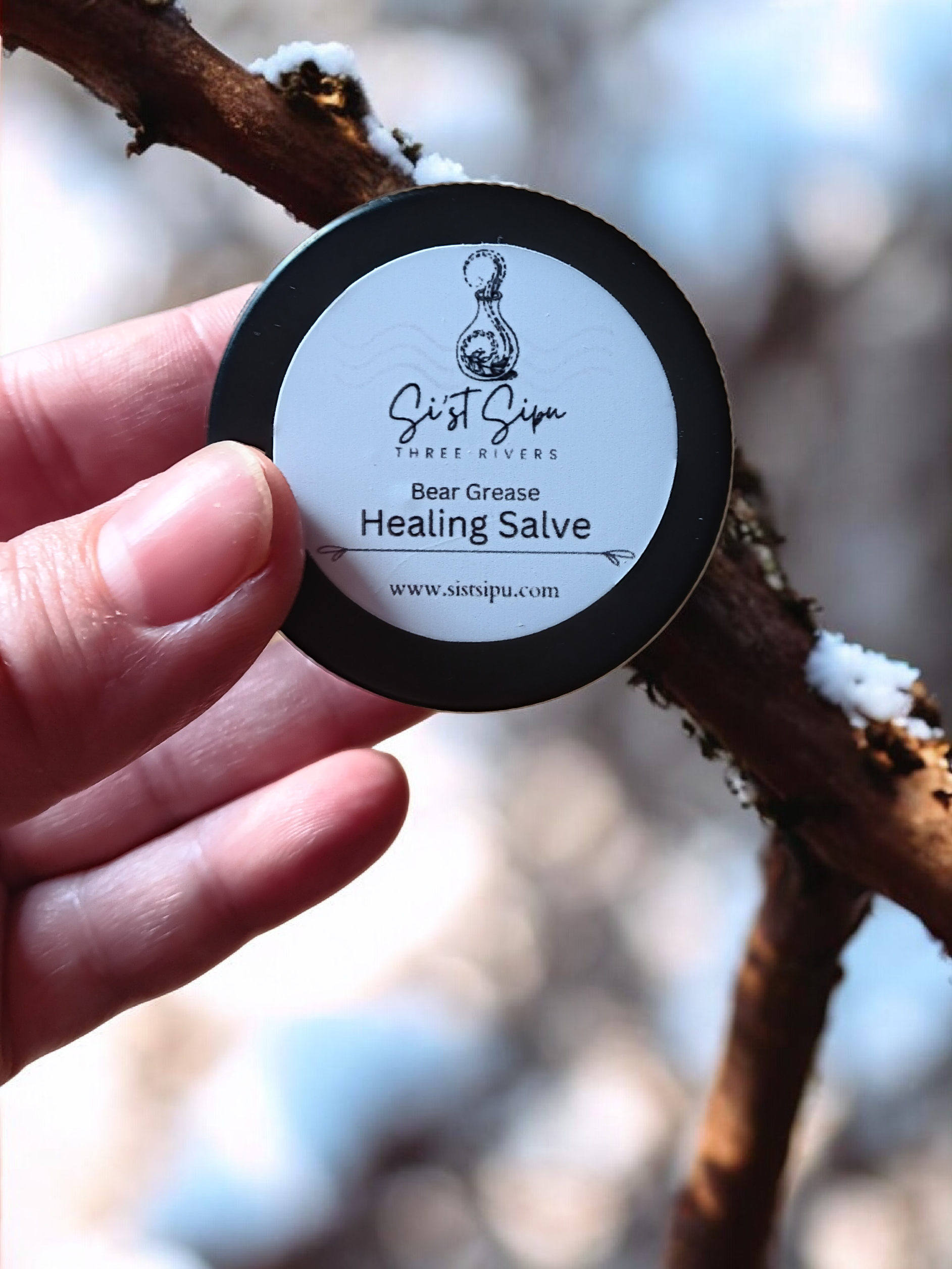 Close-up of bear grease healing salve label highlighting traditional wellness use for eczema, psoriasis, and arthritis support