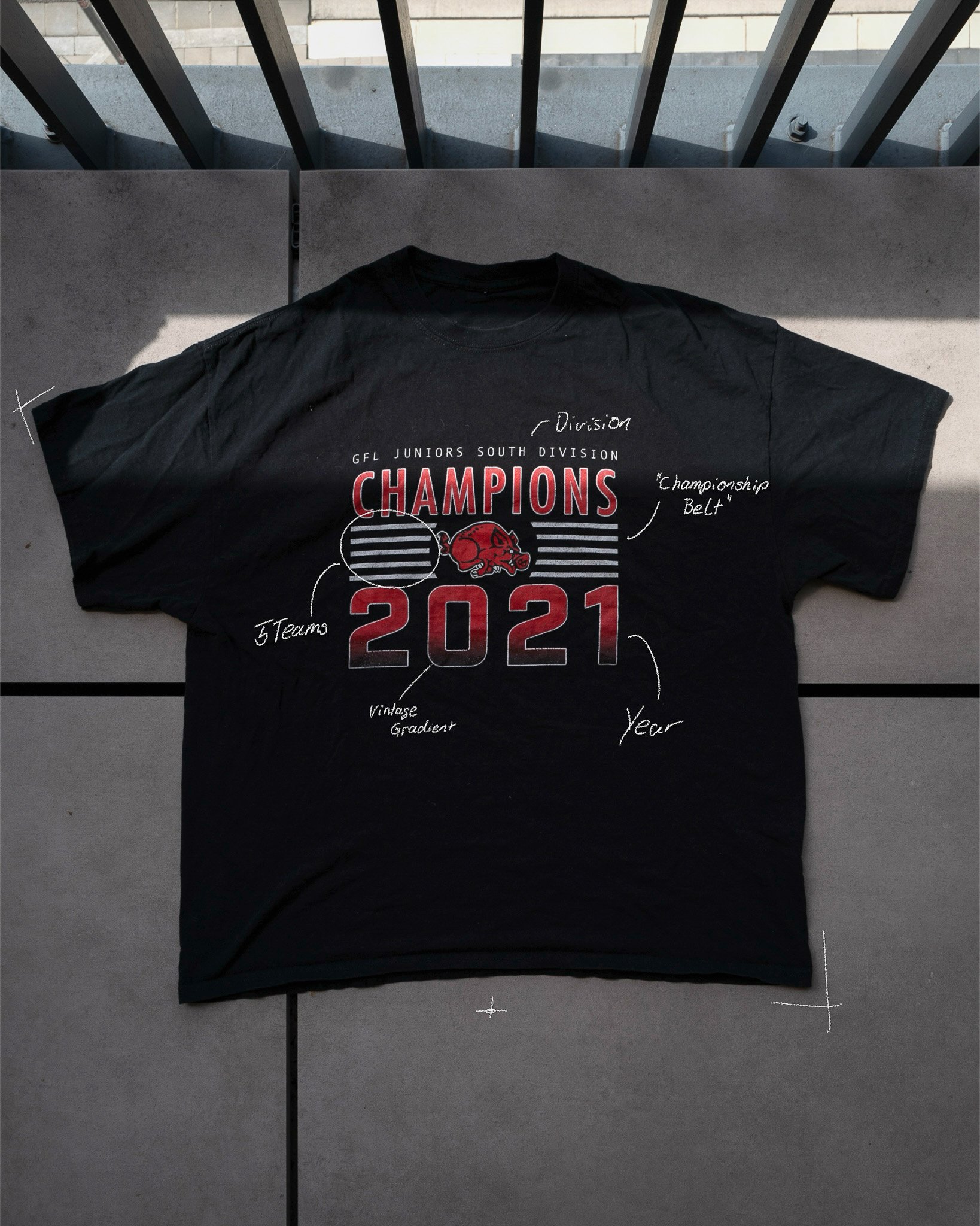 Black t-shirt with "GFL Juniors South Division Champions 2021" design