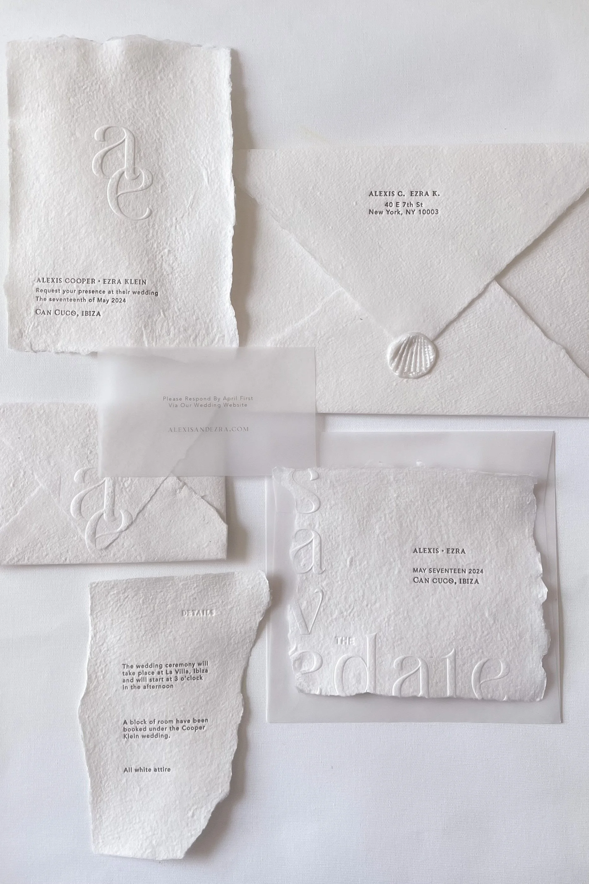 Monochromatic coastal inspired semi-custom flat lay wedding invitations, letterpress and embossing on Papier June handmade paper, Papier June signature seashell wax seal