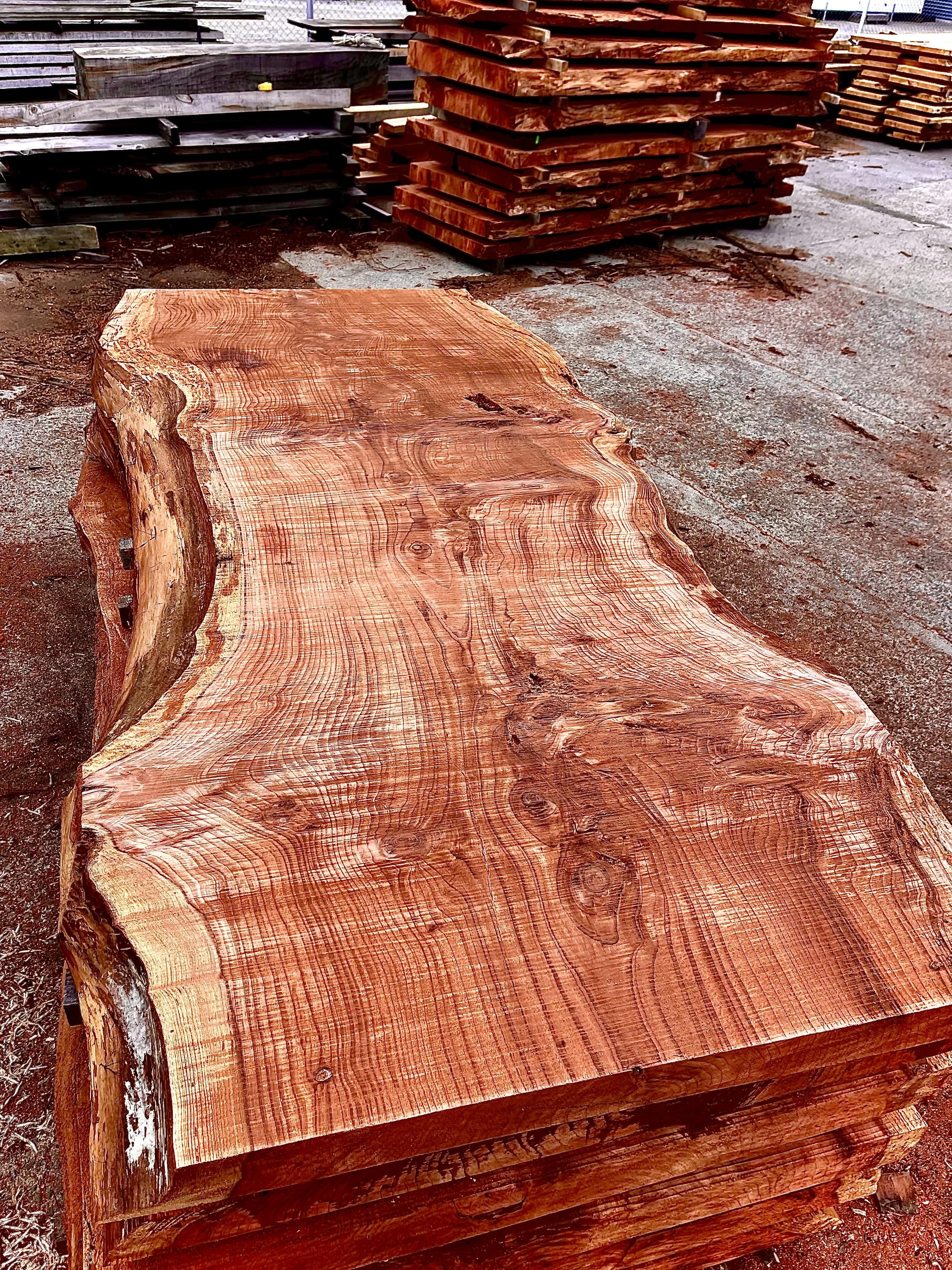 Redwood slabs from gnarly old grey log.
