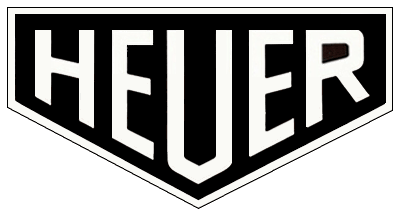 Heuer logo in black and white with bold, uppercase lettering inside a shield-shaped emblem.
