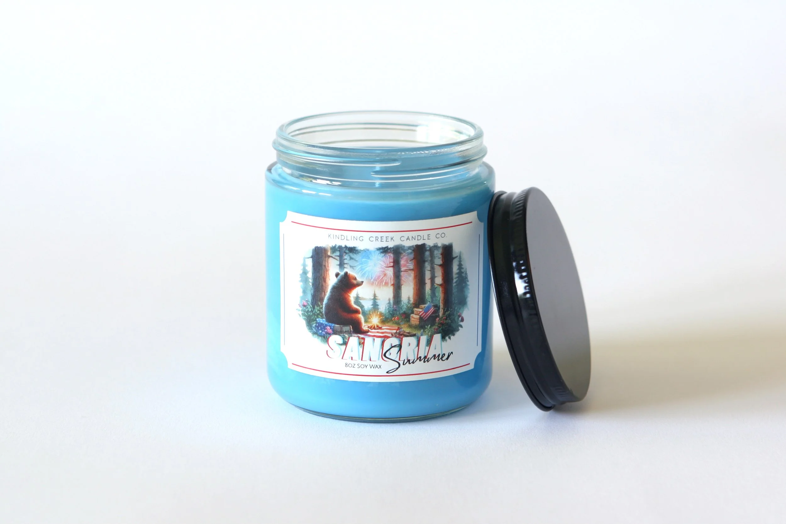 Sangria-summer-candle-blue-lid-lean.jpg